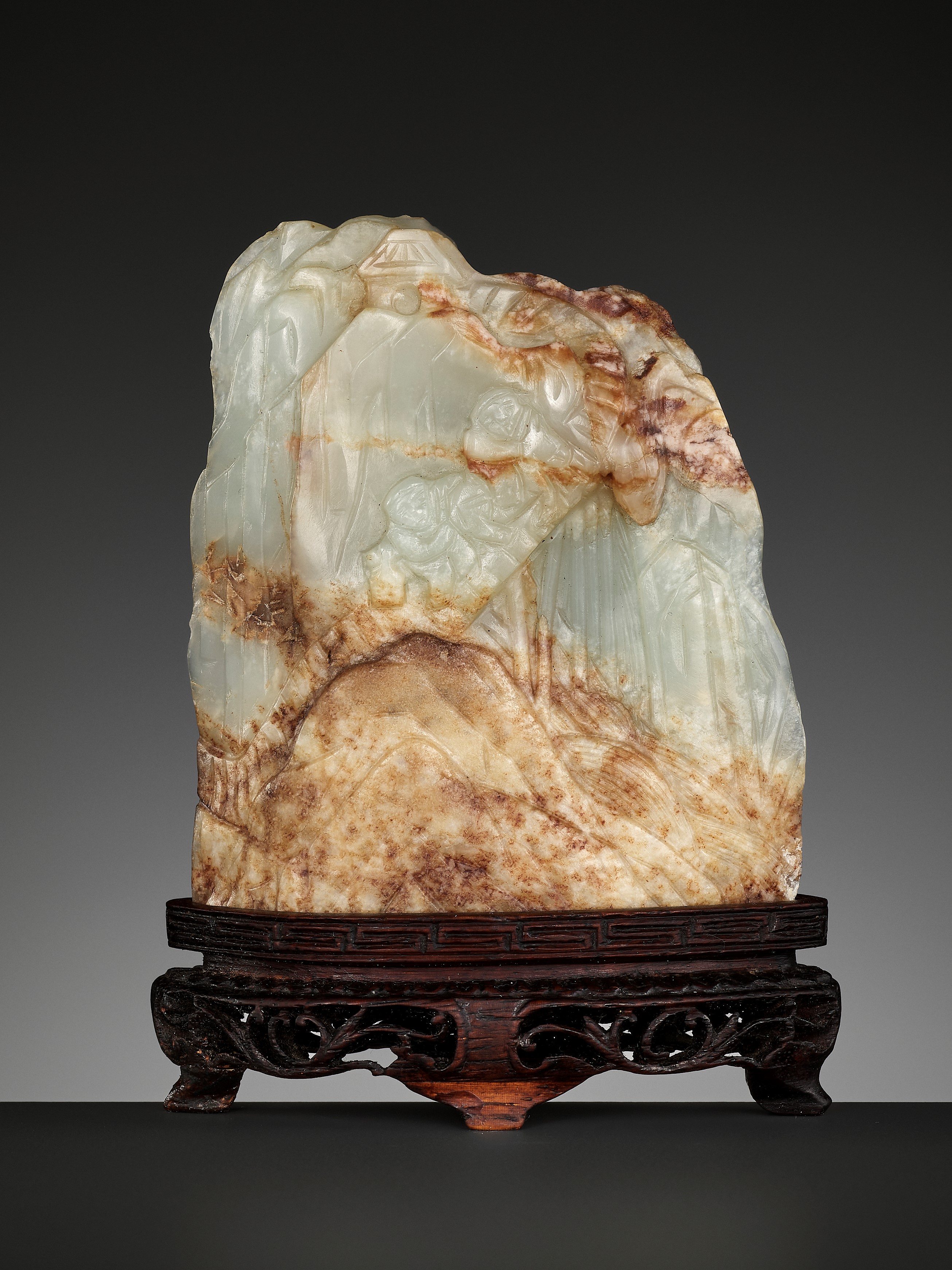 A CELADON AND RUSSET JADE MINIATURE MOUNTAIN, QING DYNASTY