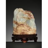 A CELADON AND RUSSET JADE MINIATURE MOUNTAIN, QING DYNASTY