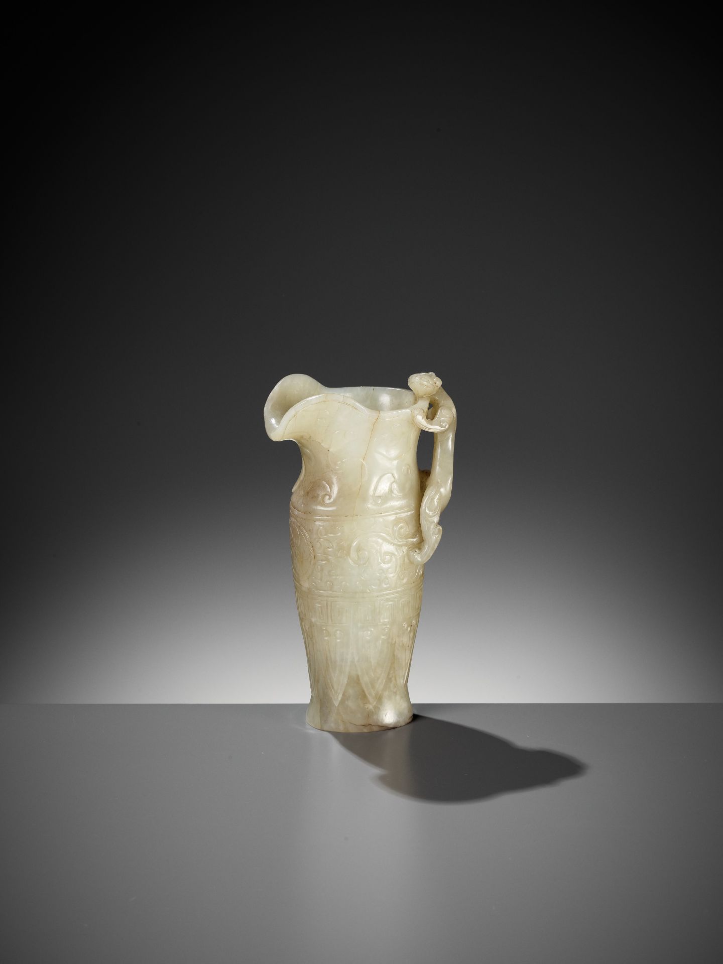 AN IMPERIAL CELADON AND RUSSET JADE 'CHILONG' RHYTON, QIANLONG MARK AND PERIOD - Bild 14 aus 17