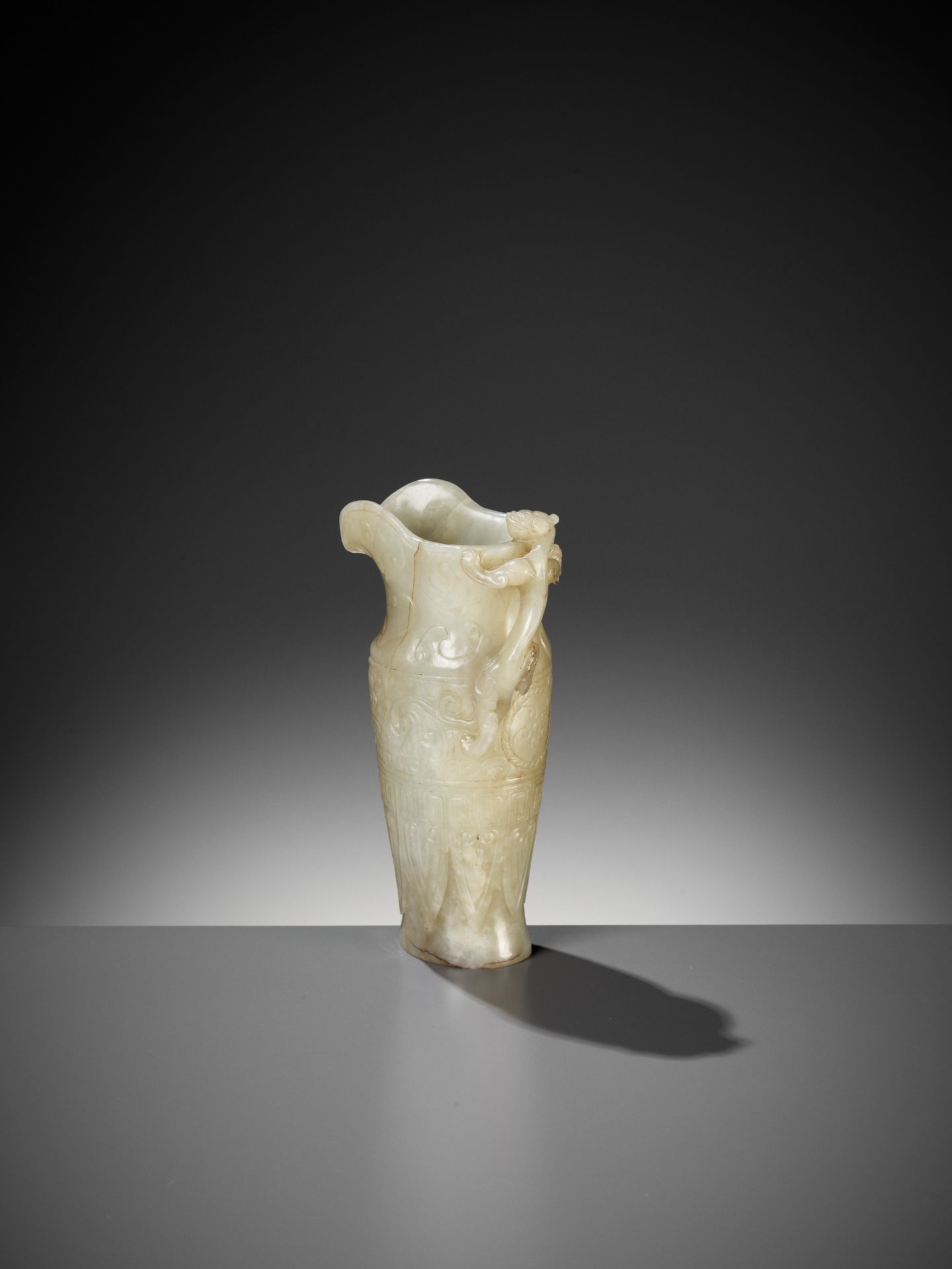 AN IMPERIAL CELADON AND RUSSET JADE 'CHILONG' RHYTON, QIANLONG MARK AND PERIOD - Image 8 of 17