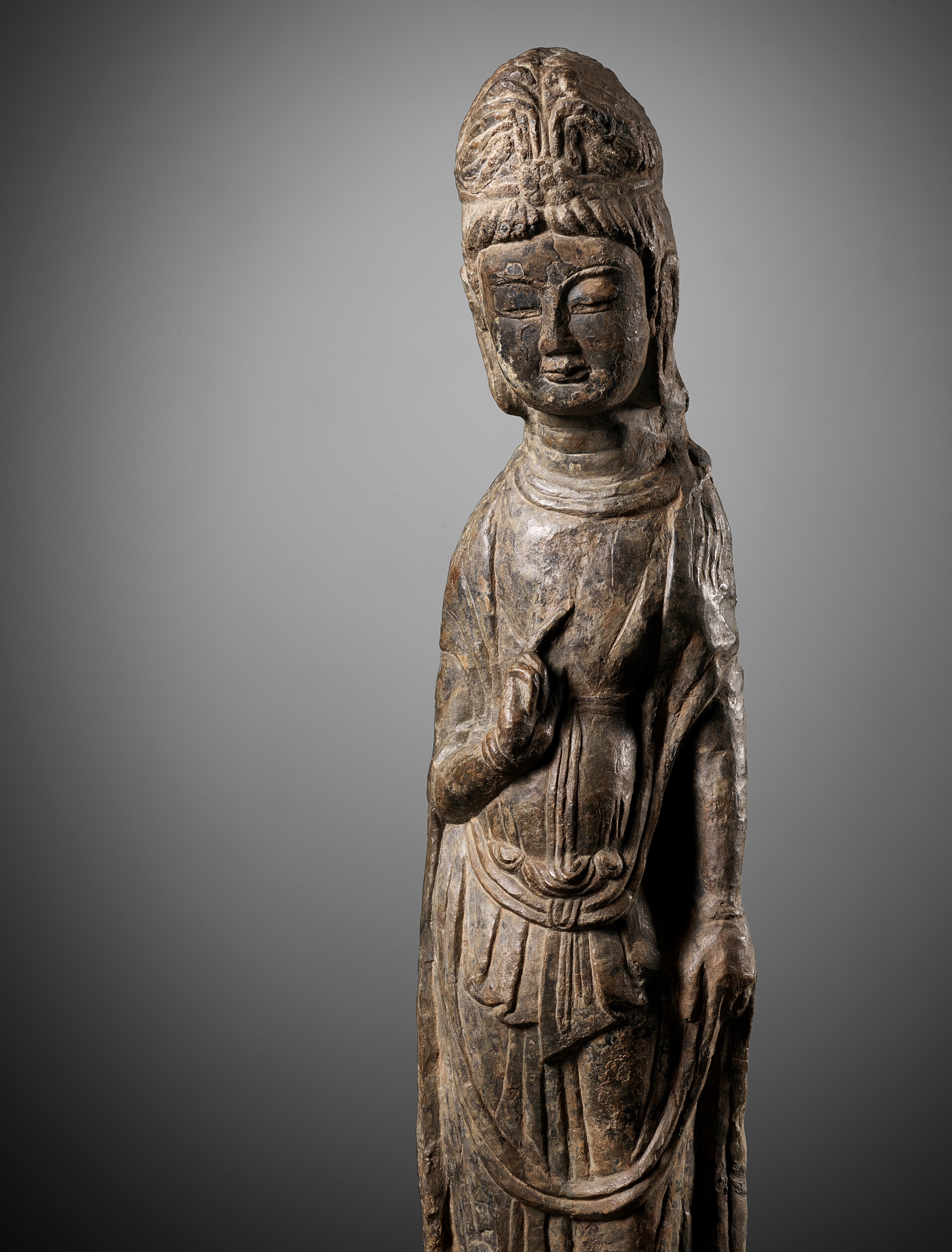 A RARE AND IMPORTANT LIMESTONE FIGURE OF A BODHISATTVA, LONGMEN GROTTOES, NORTHERN WEI DYNASTY
