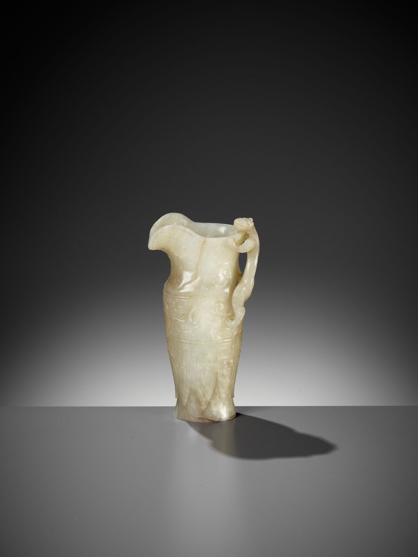 AN IMPERIAL CELADON AND RUSSET JADE 'CHILONG' RHYTON, QIANLONG MARK AND PERIOD - Image 7 of 17