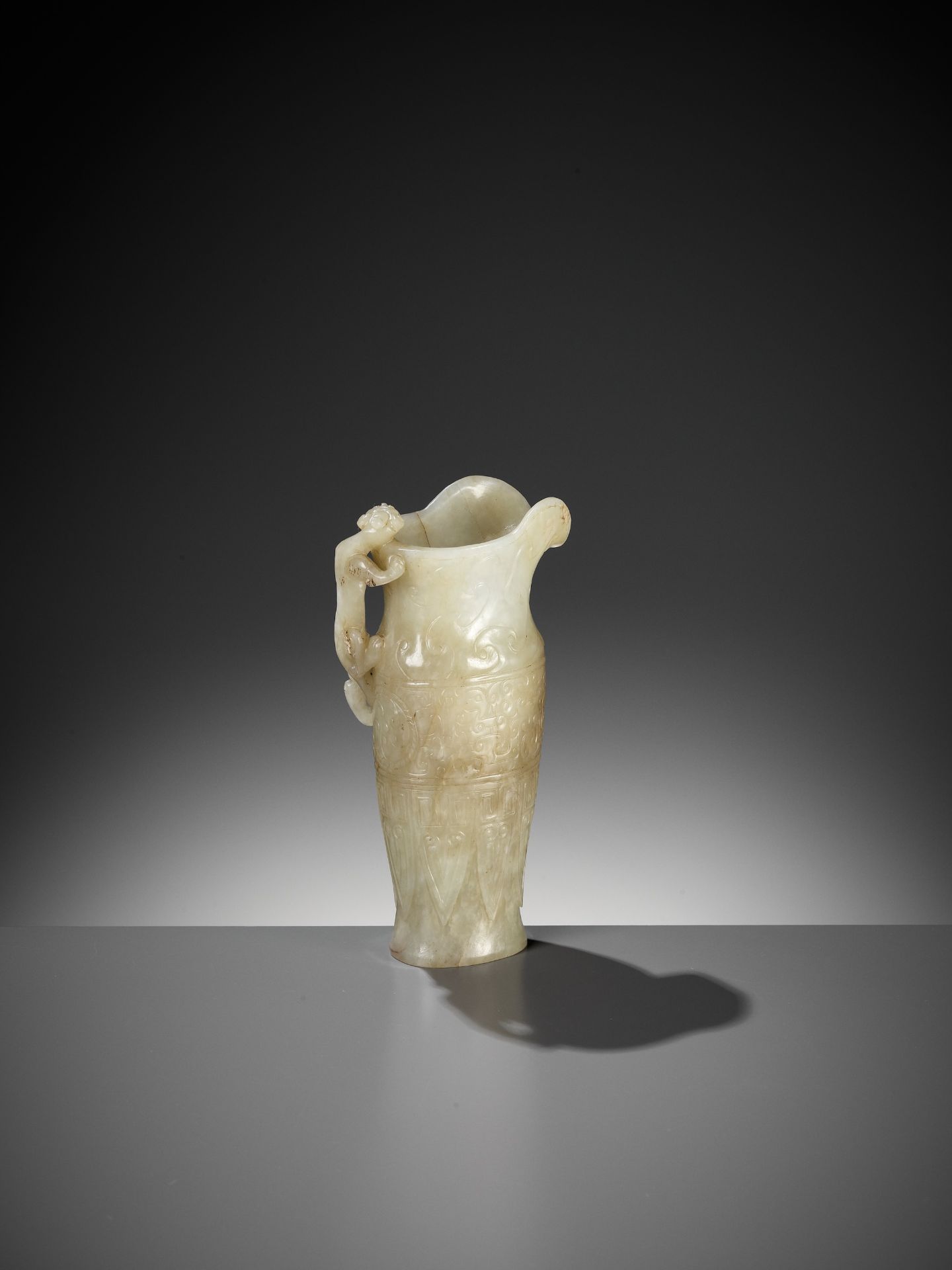 AN IMPERIAL CELADON AND RUSSET JADE 'CHILONG' RHYTON, QIANLONG MARK AND PERIOD - Image 10 of 17