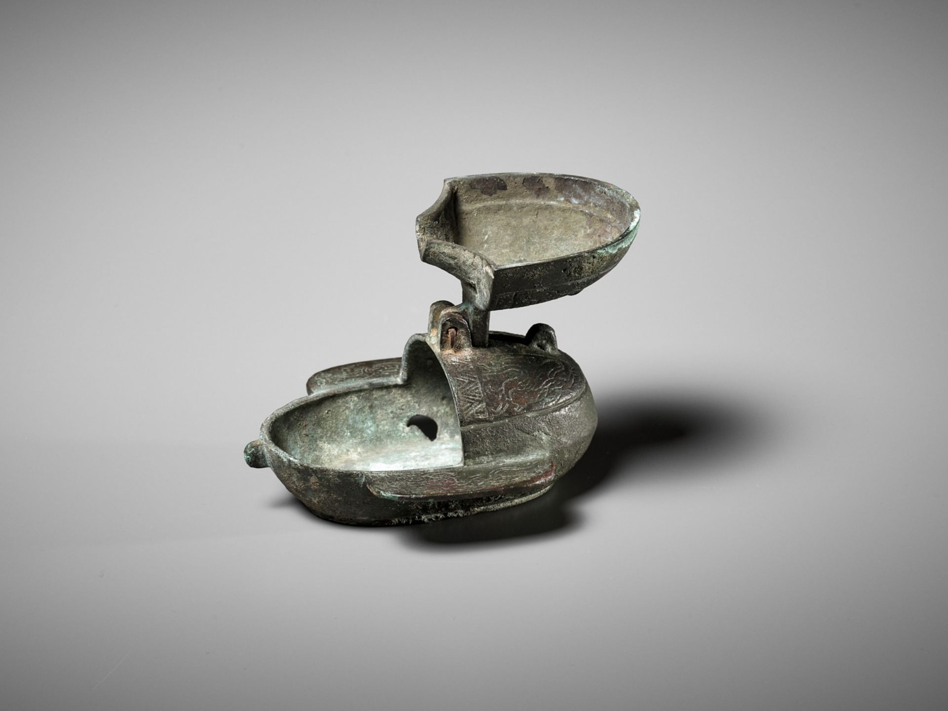 AN OVAL BRONZE FOLDING OIL LAMP, DENG, HAN DYNASTY - Image 11 of 16