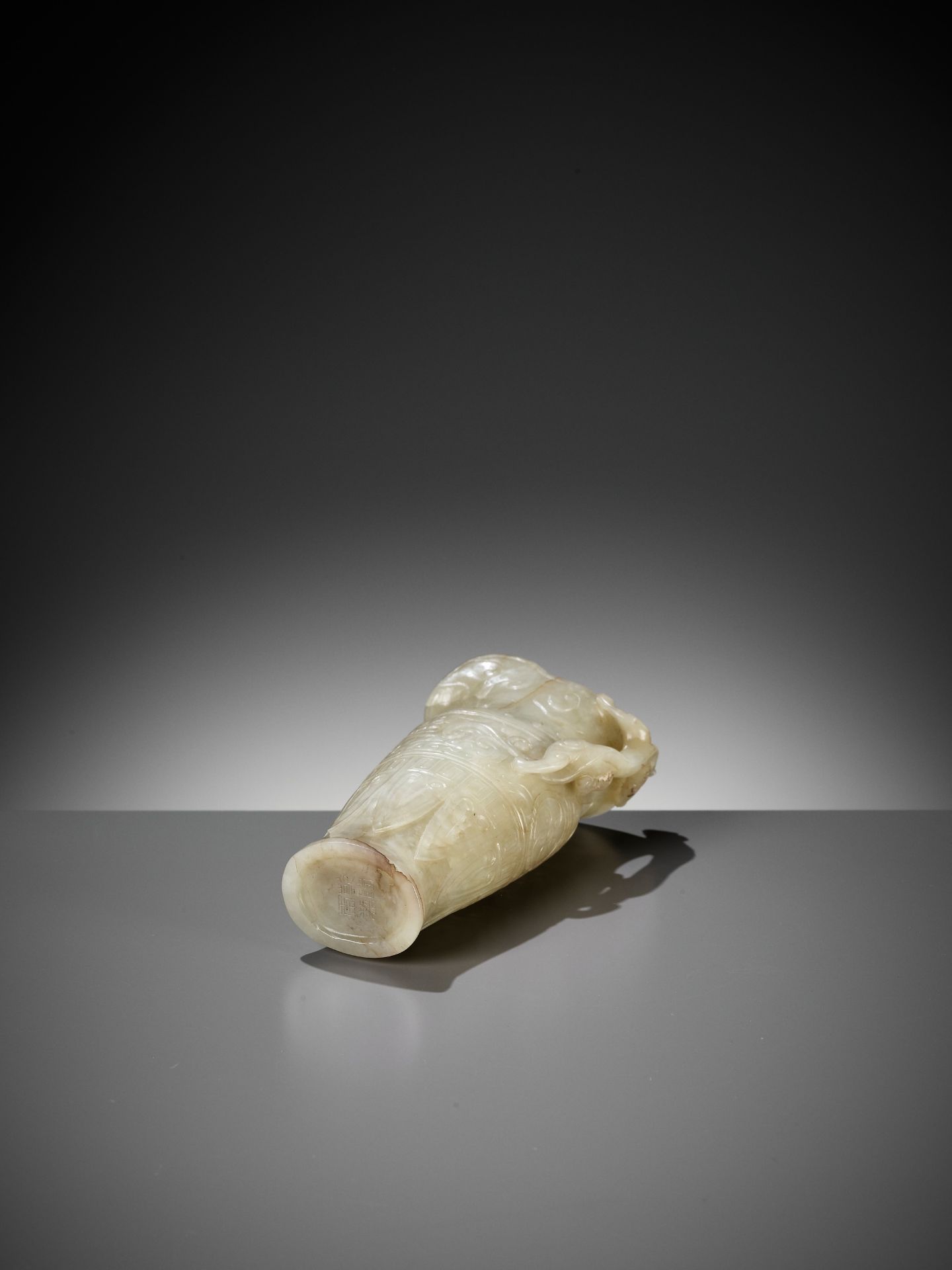 AN IMPERIAL CELADON AND RUSSET JADE 'CHILONG' RHYTON, QIANLONG MARK AND PERIOD - Image 16 of 17