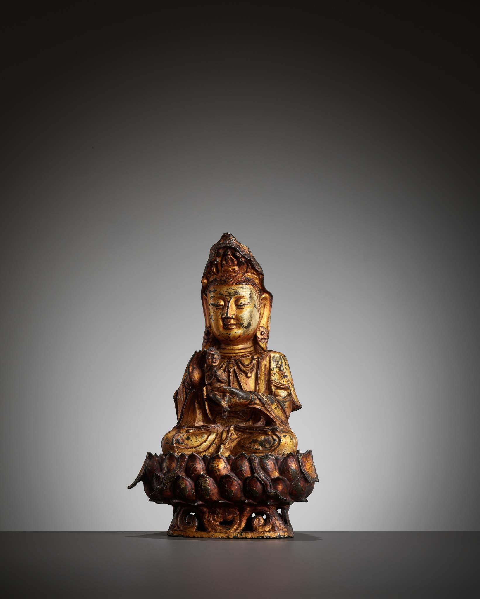 A GILT-LACQUERED BRONZE FIGURE OF SONGZI GUANYIN, MING DYNASTY - Image 7 of 12