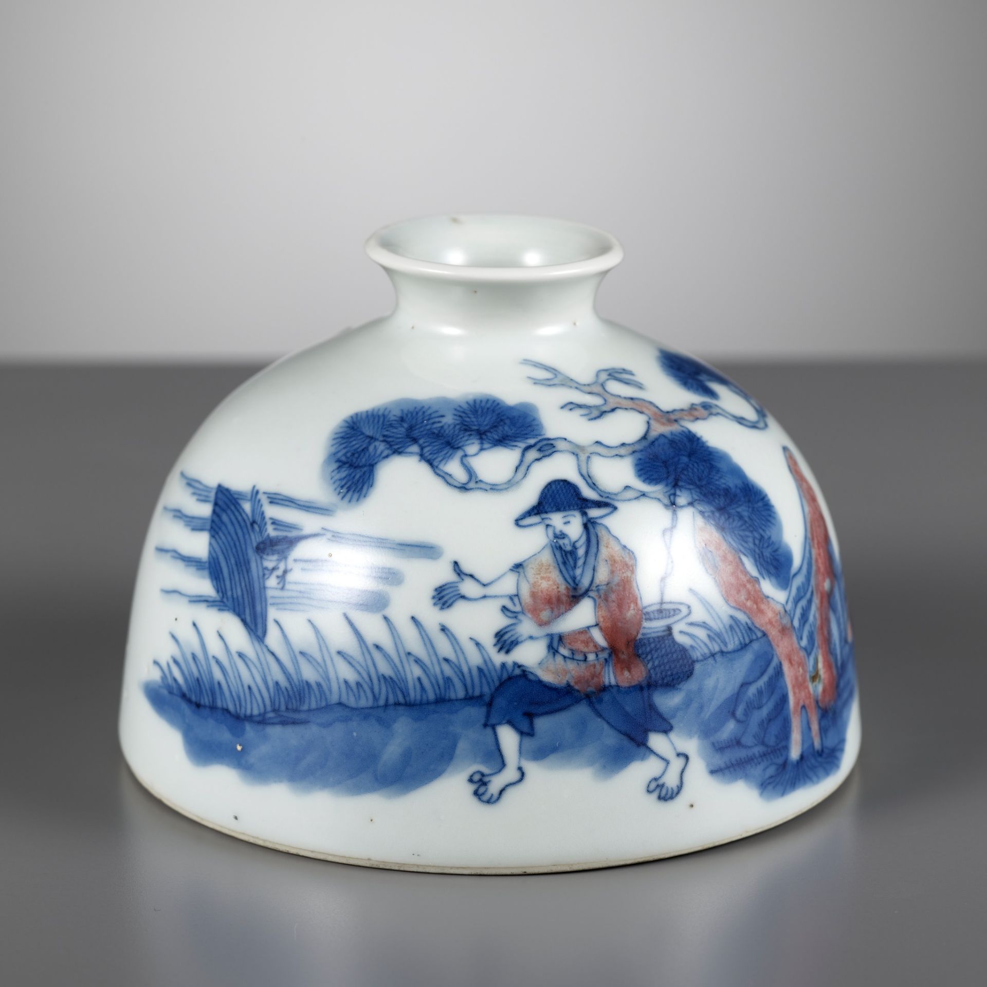 AN UNDERGLAZE-BLUE AND COPPER-RED 'FISHERMAN' BEEHIVE WATER POT, TAIBAI ZUN, YONGZHENG MARK