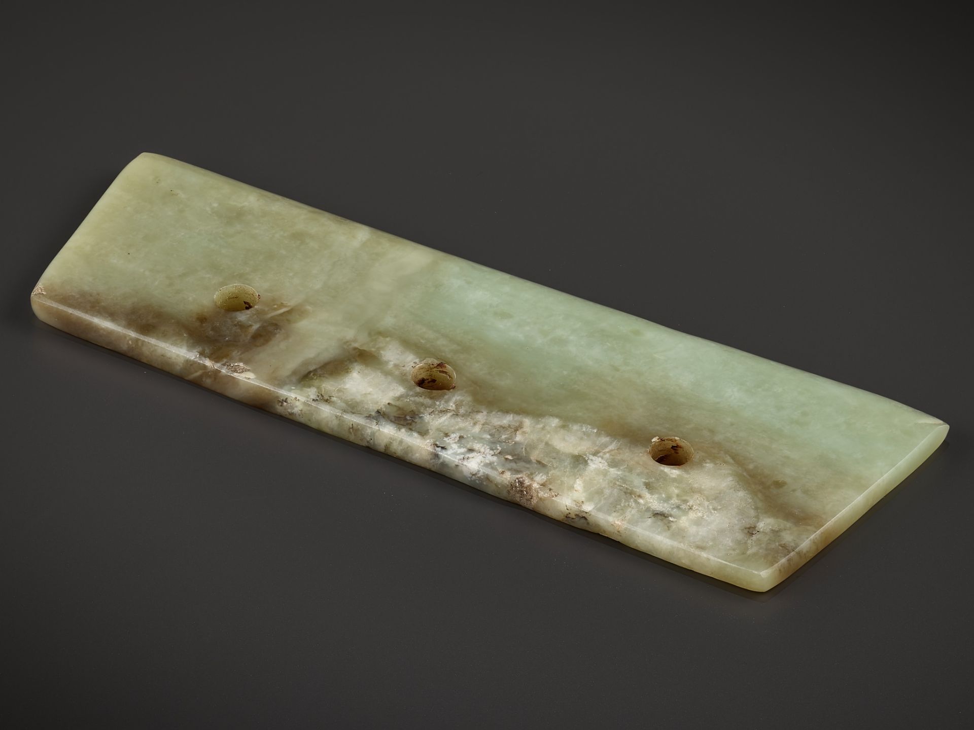 A GREEN JADE CEREMONIAL BLADE, NEOLITHIC PERIOD