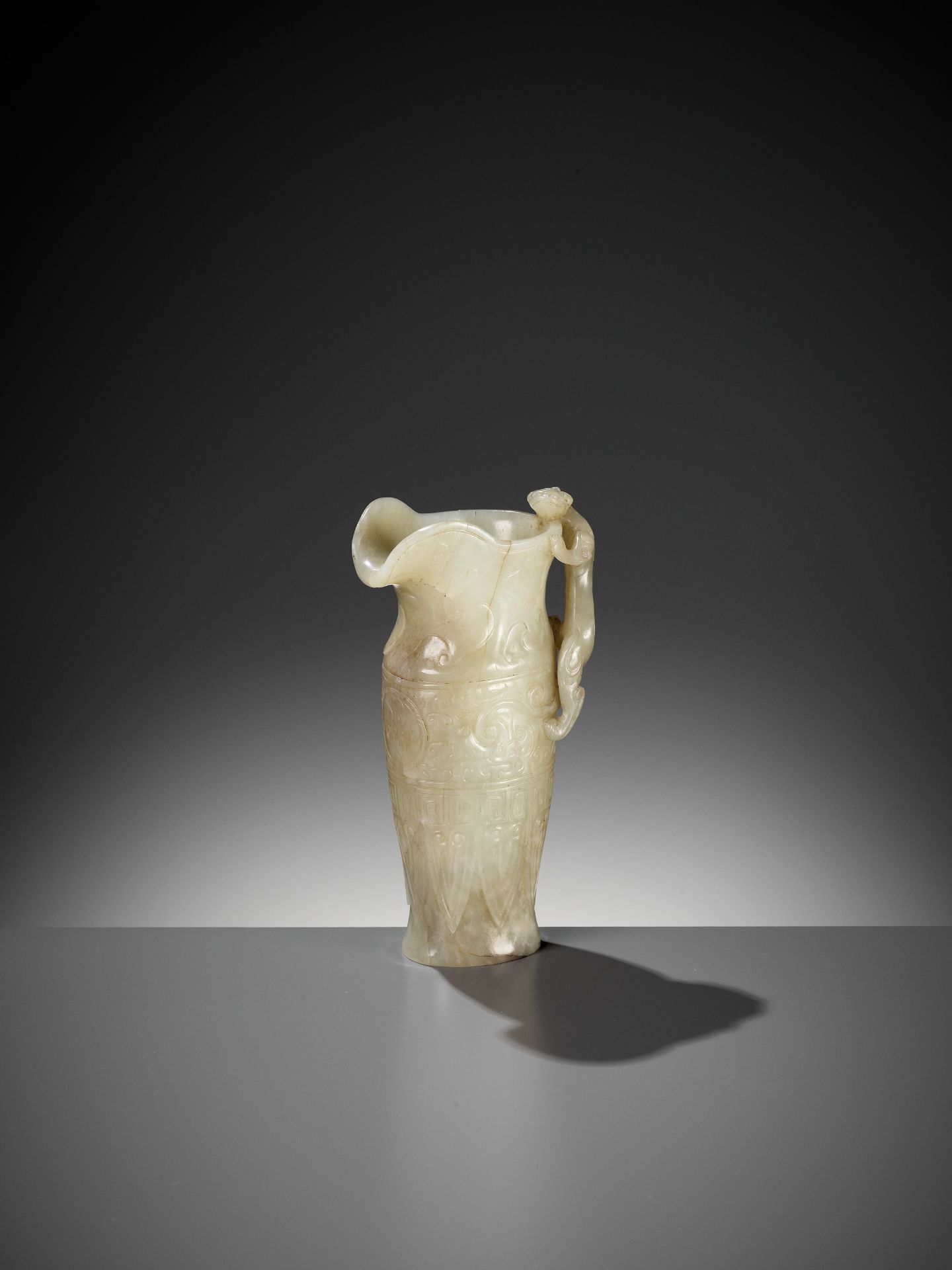 AN IMPERIAL CELADON AND RUSSET JADE 'CHILONG' RHYTON, QIANLONG MARK AND PERIOD - Image 6 of 17