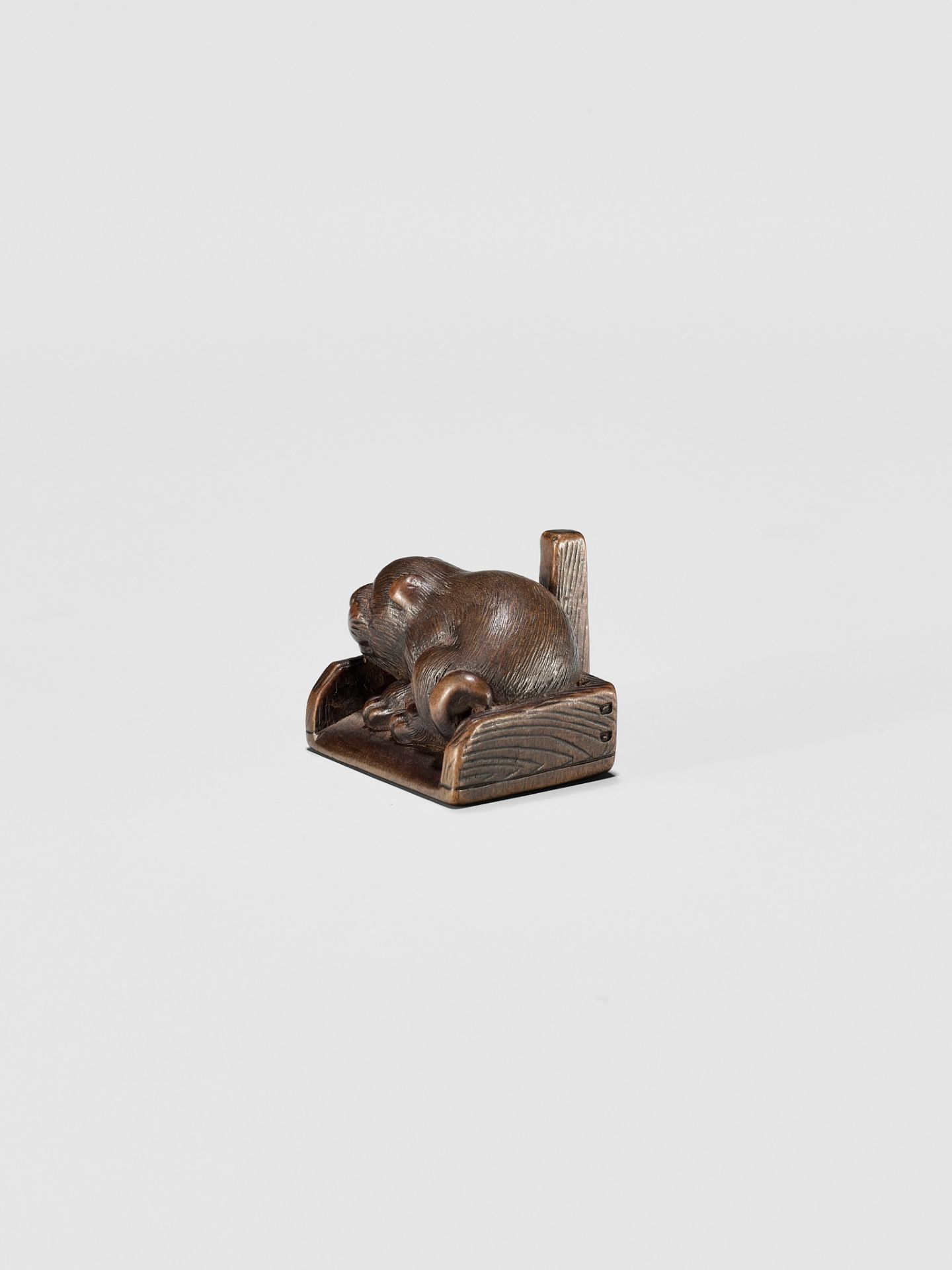 KOKEI: A WOOD NETSUKE OF A PUPPY INSIDE A DUSTPAN - Image 3 of 9