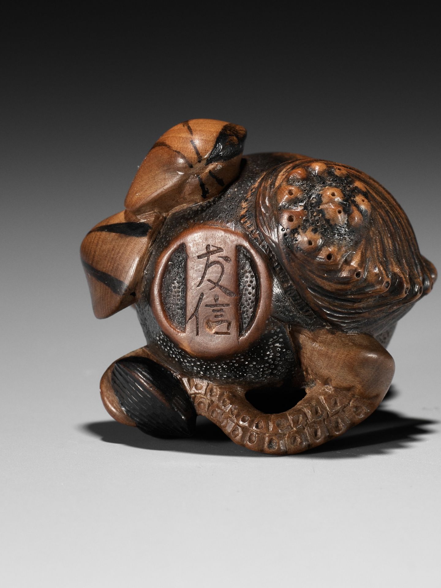 TOMONOBU: A STAINED WOOD NETSUKE OF A TRAPPED OCTOPUS (TAKO TSUBO) - Image 10 of 10