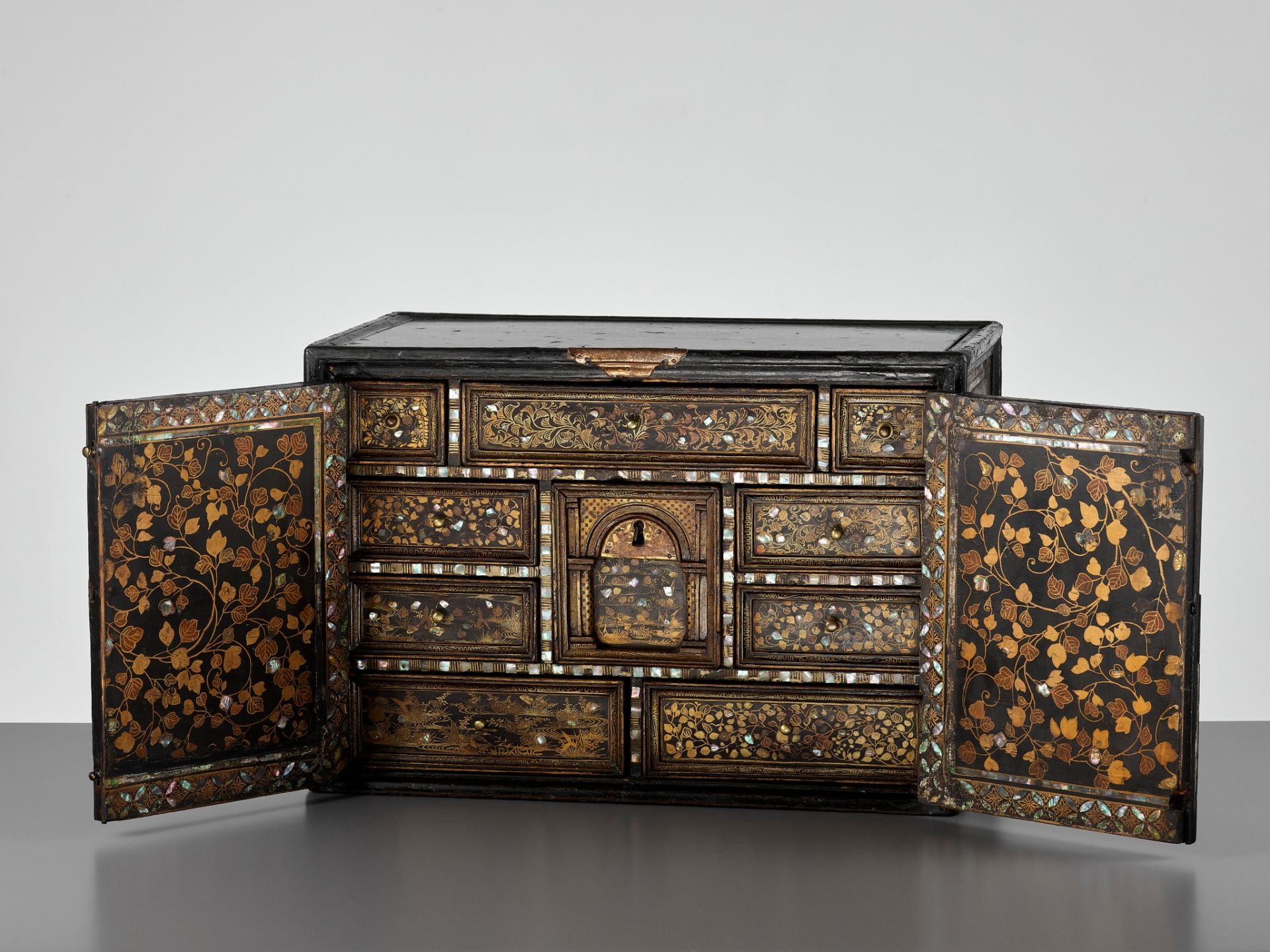 A RARE SHELL-INLAID NANBAN LACQUER CABINET