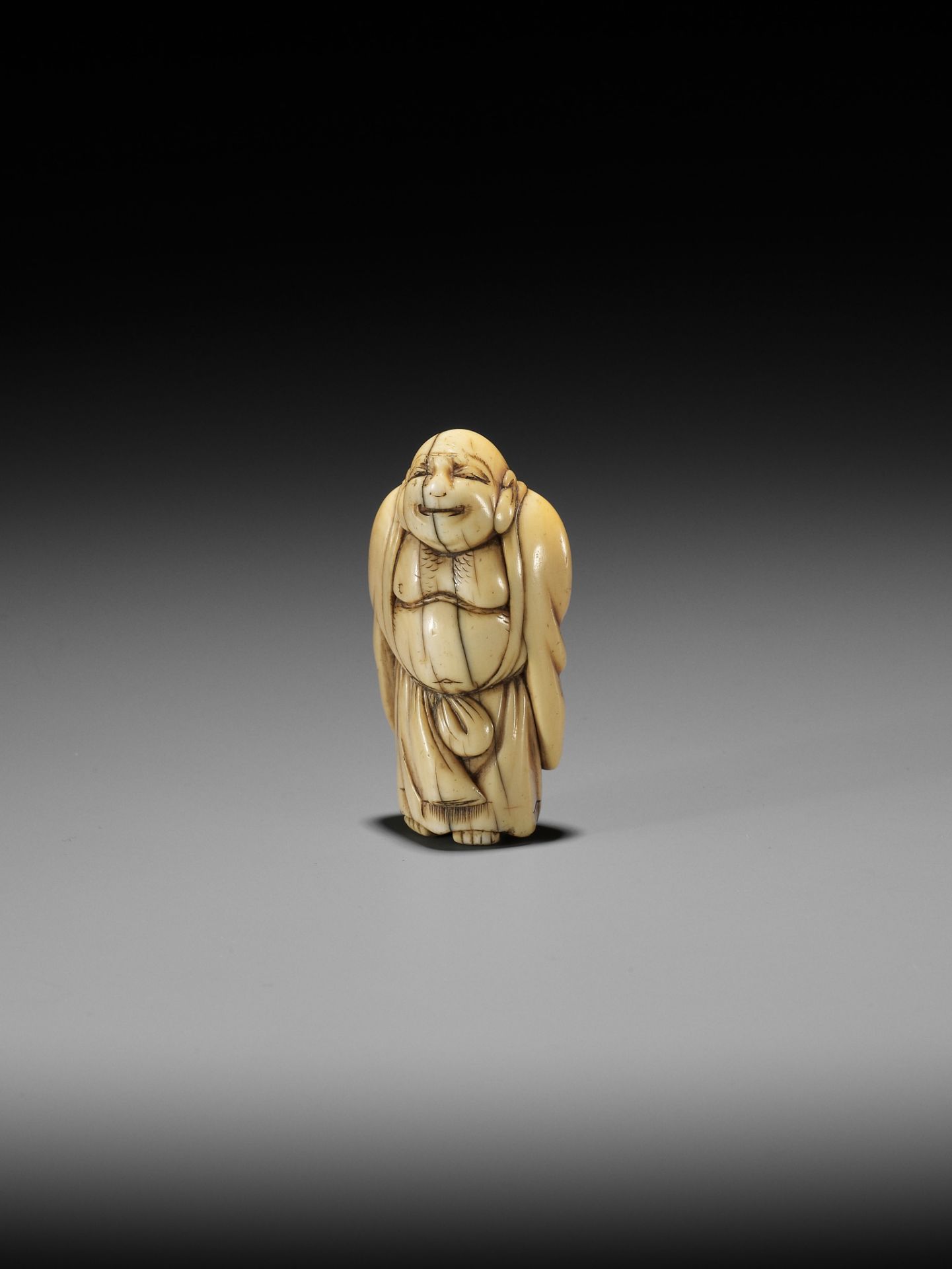 TOMO: AN EARLY OSAKA SCHOOL IVORY NETSUKE OF HOTEI - Image 3 of 10