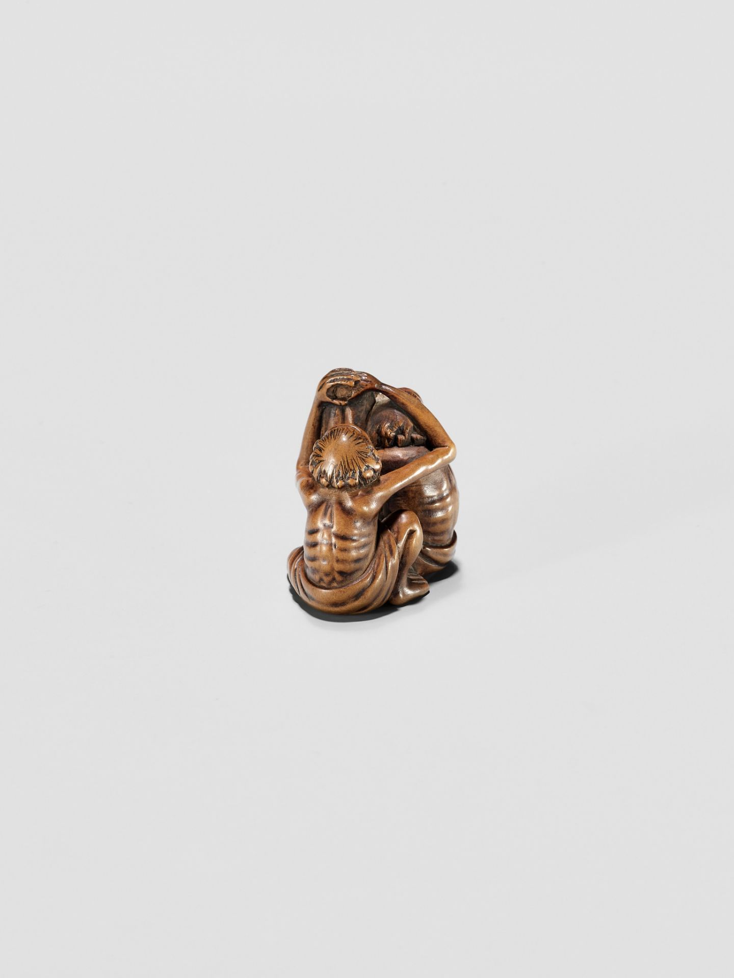 A TOMOCHIKA SCHOOL WOOD NETSUKE OF ASHINAGA AND TENAGA - Image 3 of 10