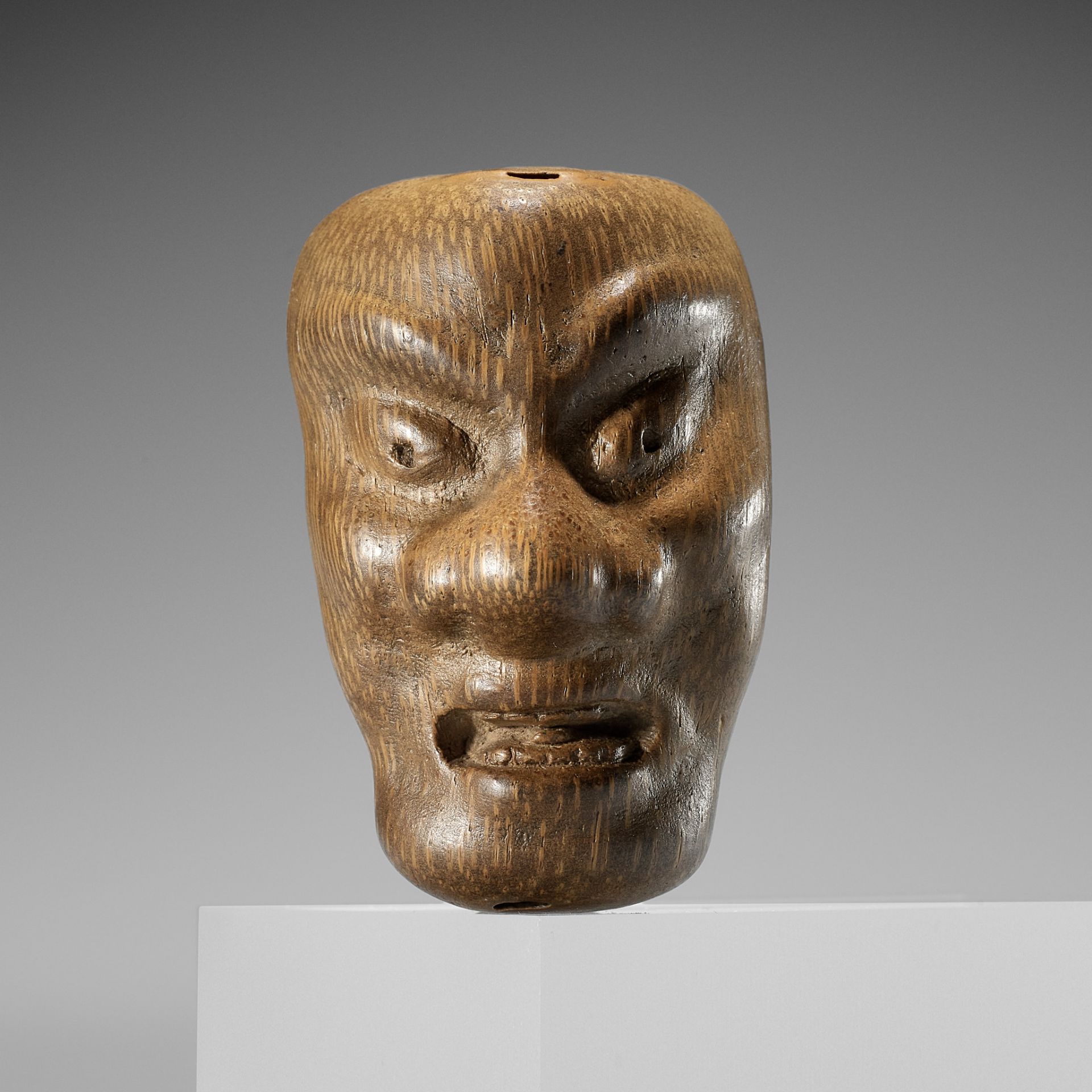 YORIMITSU: A RARE AND UNUSUAL BAMBOO OMAI TYPE MASK NETSUKE