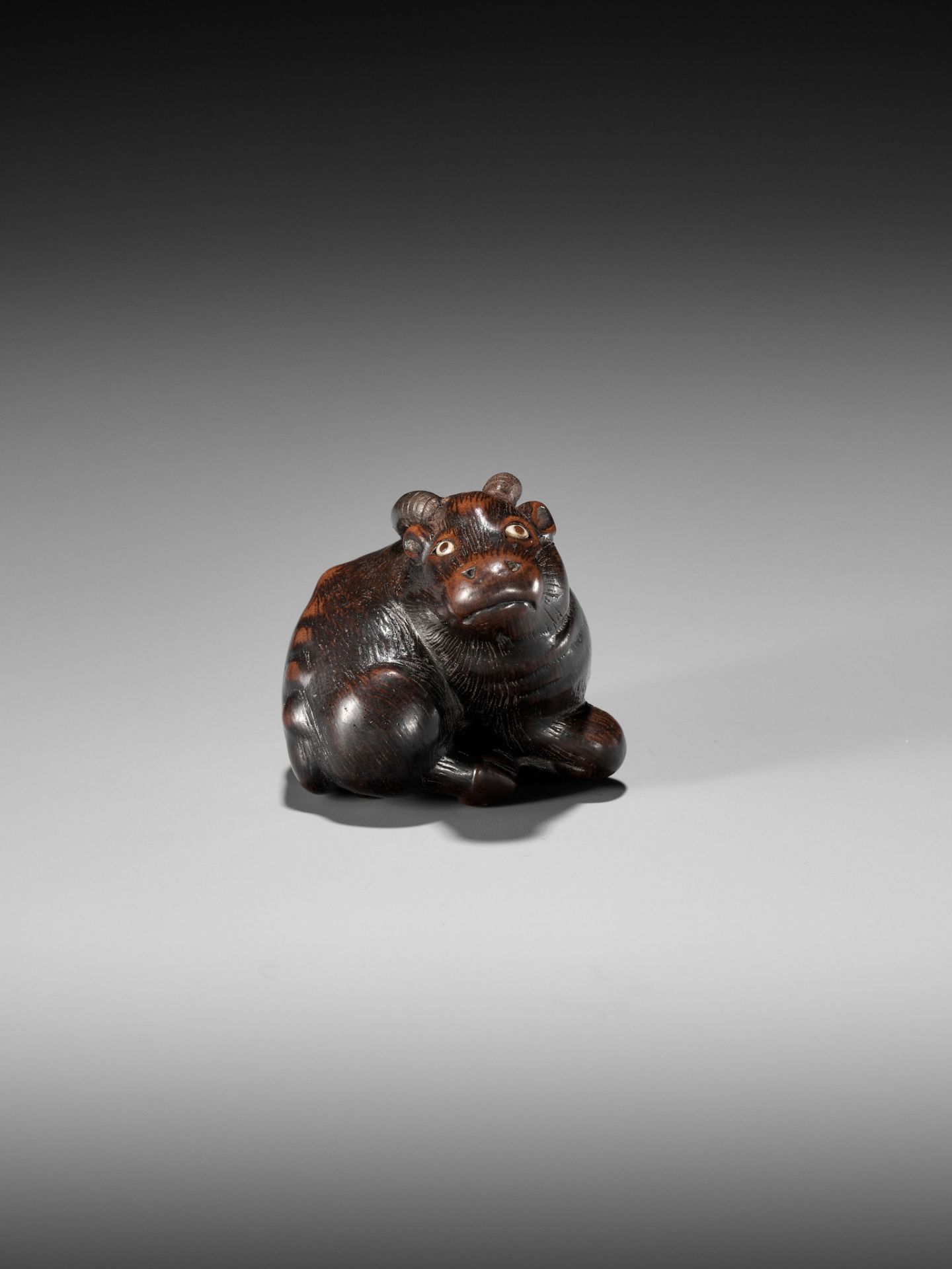 MASAKAZU: A FINE WOOD NETSUKE OF A RECUMBENT GOAT - Image 5 of 8