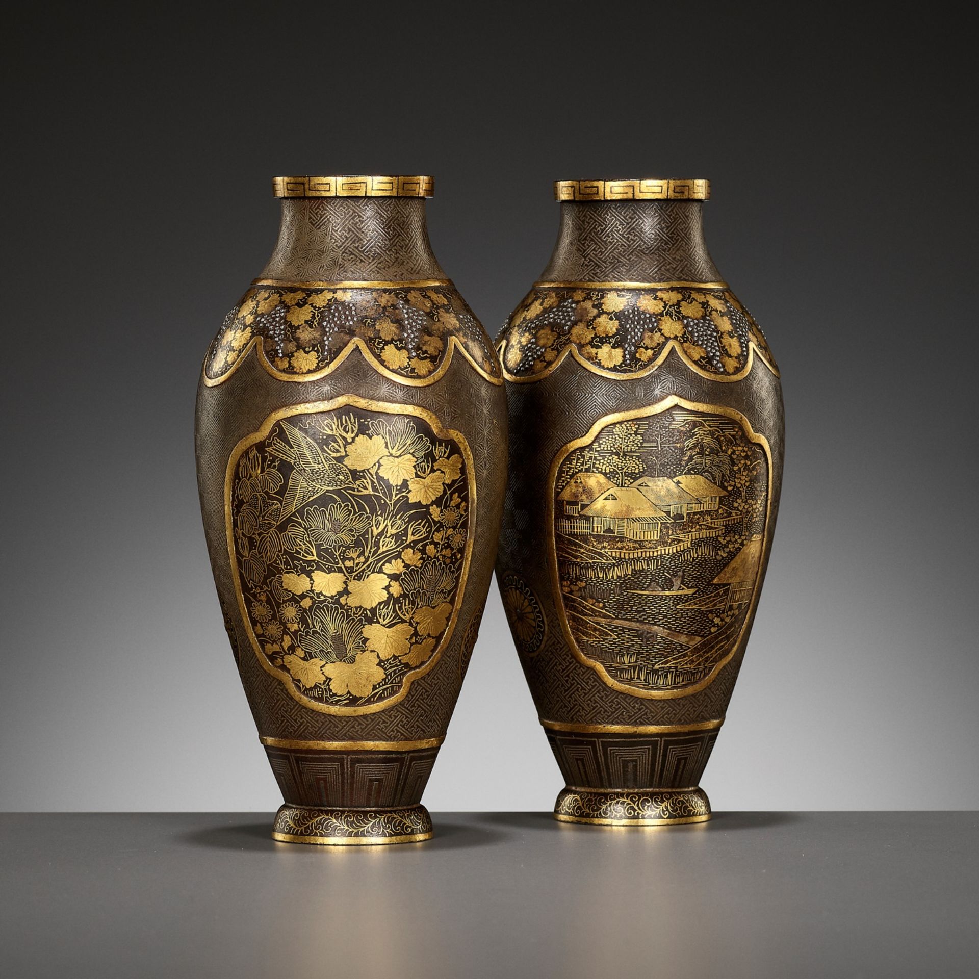 MORIGUCHI: A PAIR OF KOMAI-STYLE DAMASCENED IRON VASES