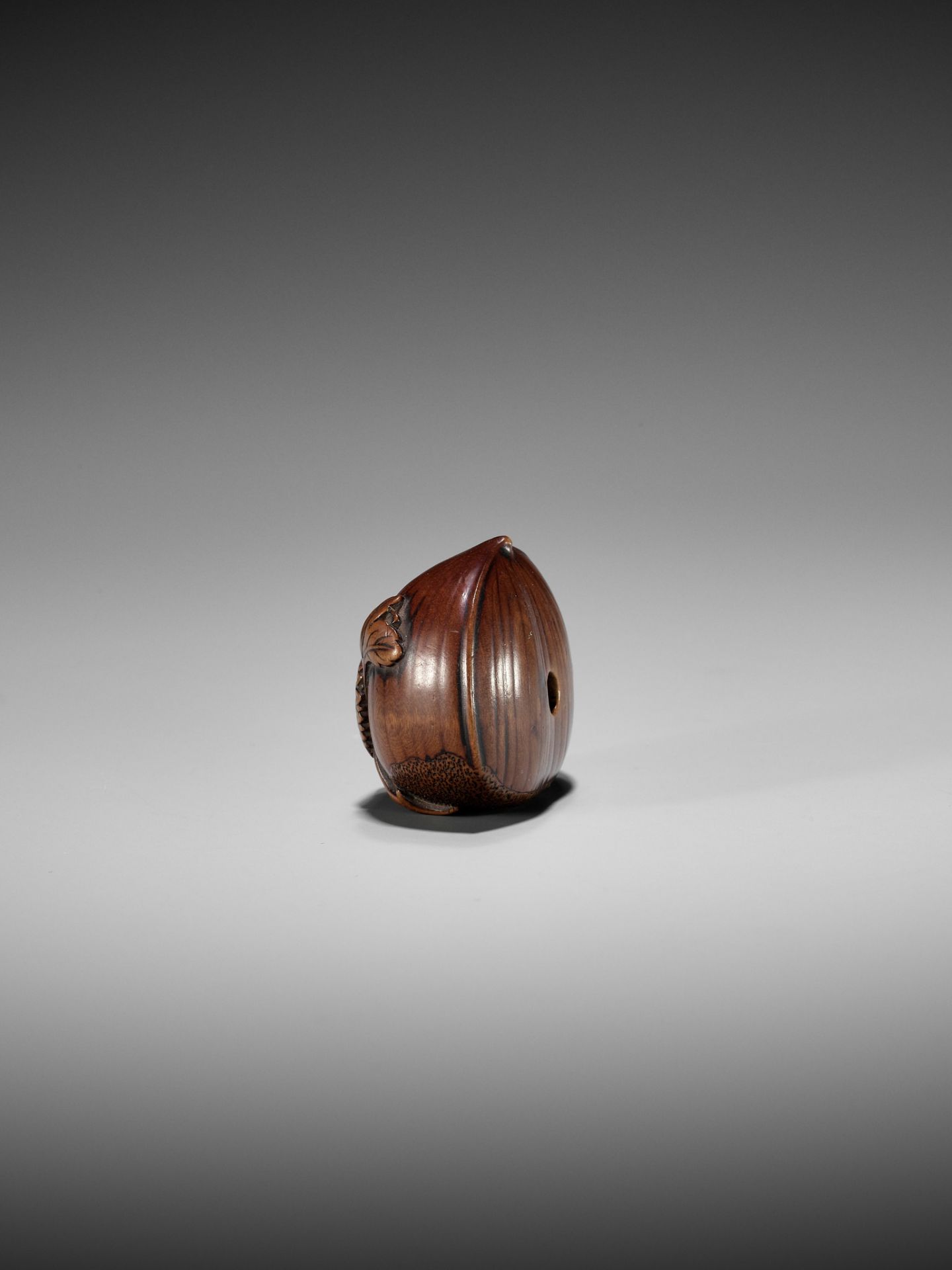 AN EARLY AUTUMNAL WOOD NETSUKE OF A CHESTNUT WITH CHRYSANTHEMUM - Image 3 of 7