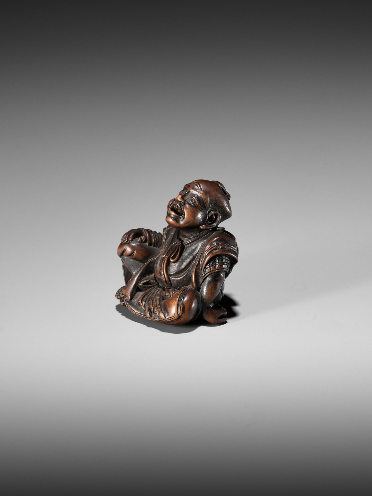 SHUMIN: A FINE WOOD NETSUKE OF A TEMPLE SERVANT - Image 2 of 10