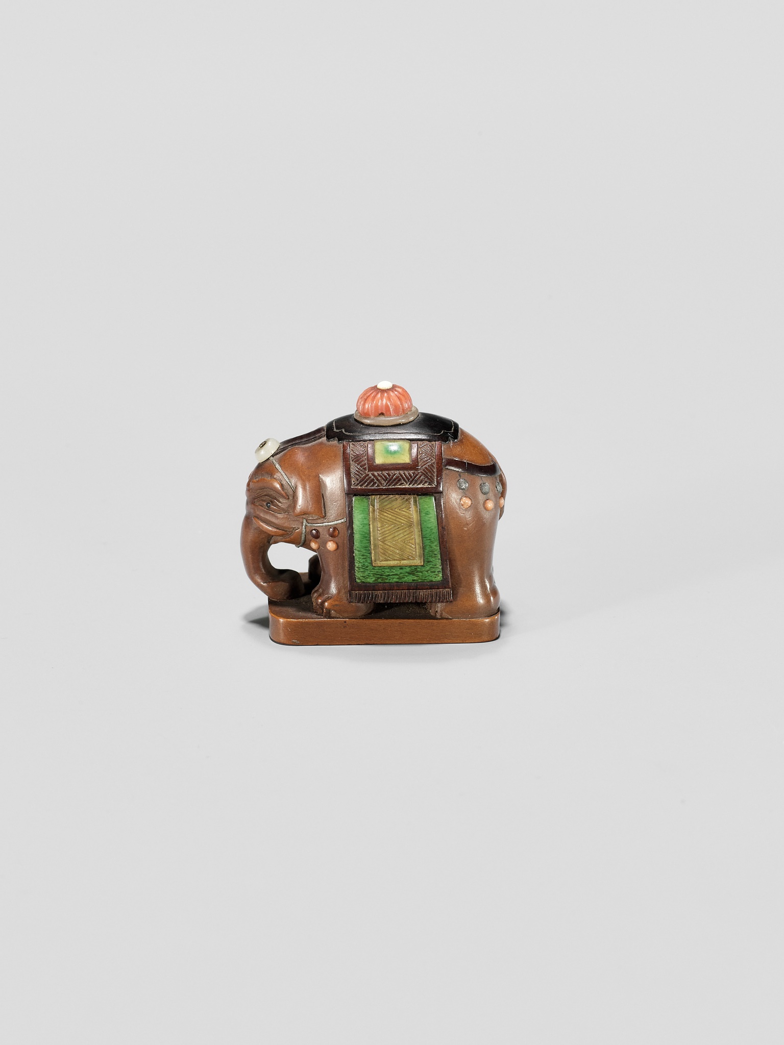 DOSHO: A SHIBAYAMA-INLAID WOOD NETSUKE OF A CAPARISONED ELEPHANT - Image 2 of 10