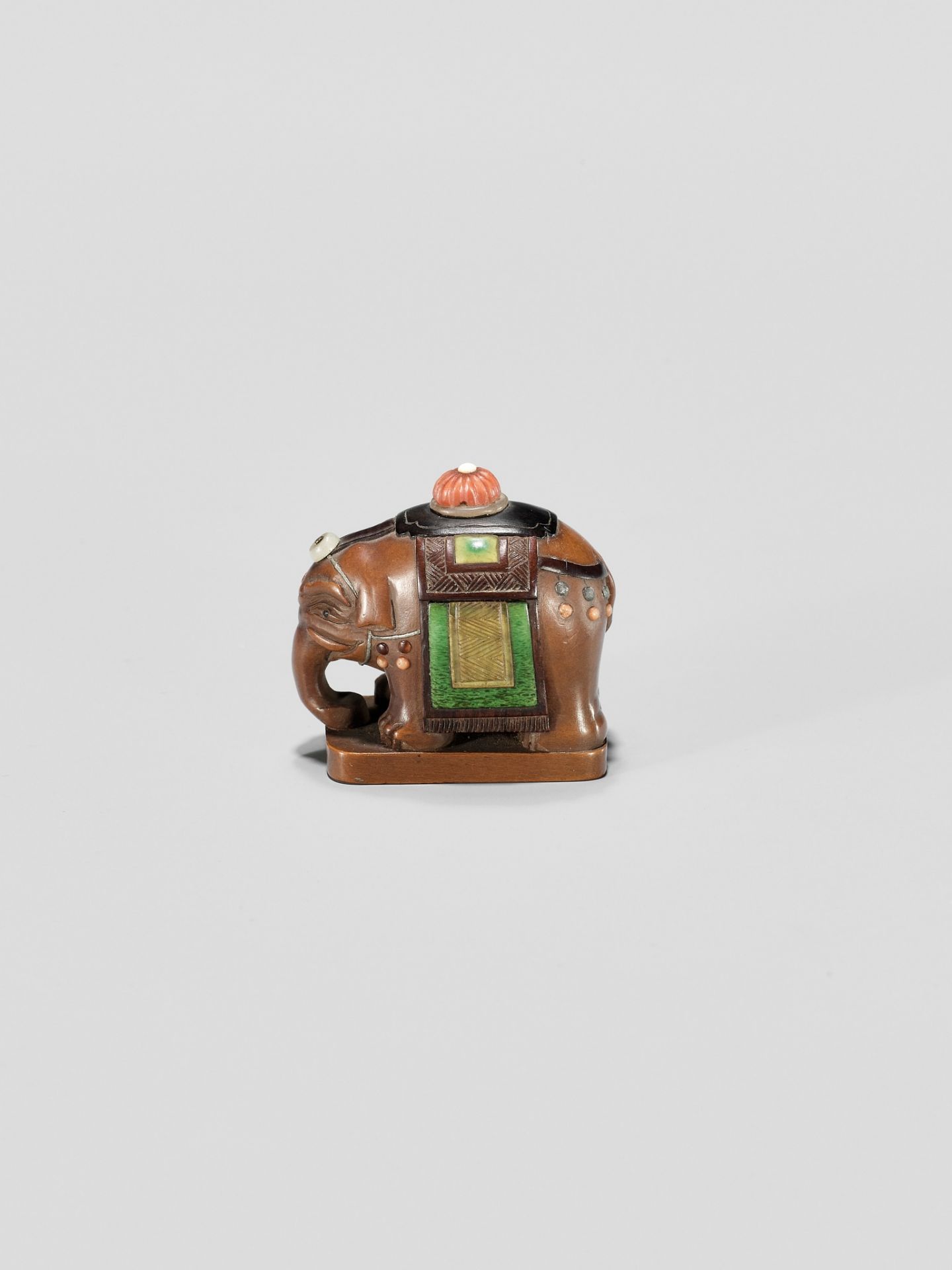 DOSHO: A SHIBAYAMA-INLAID WOOD NETSUKE OF A CAPARISONED ELEPHANT - Image 2 of 10