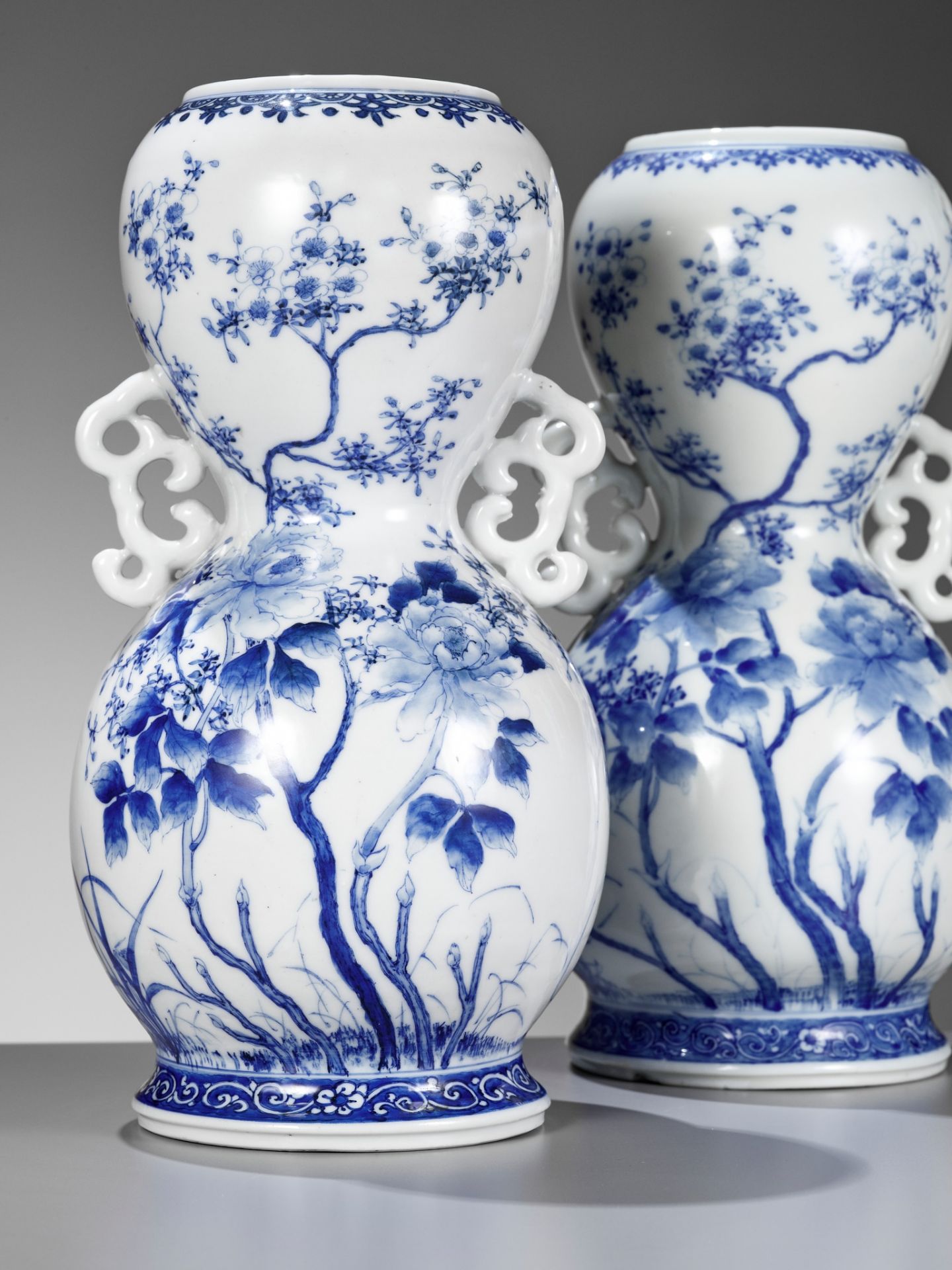 A PAIR OF BLUE AND WHITE ARITA PORCELAIN VASES