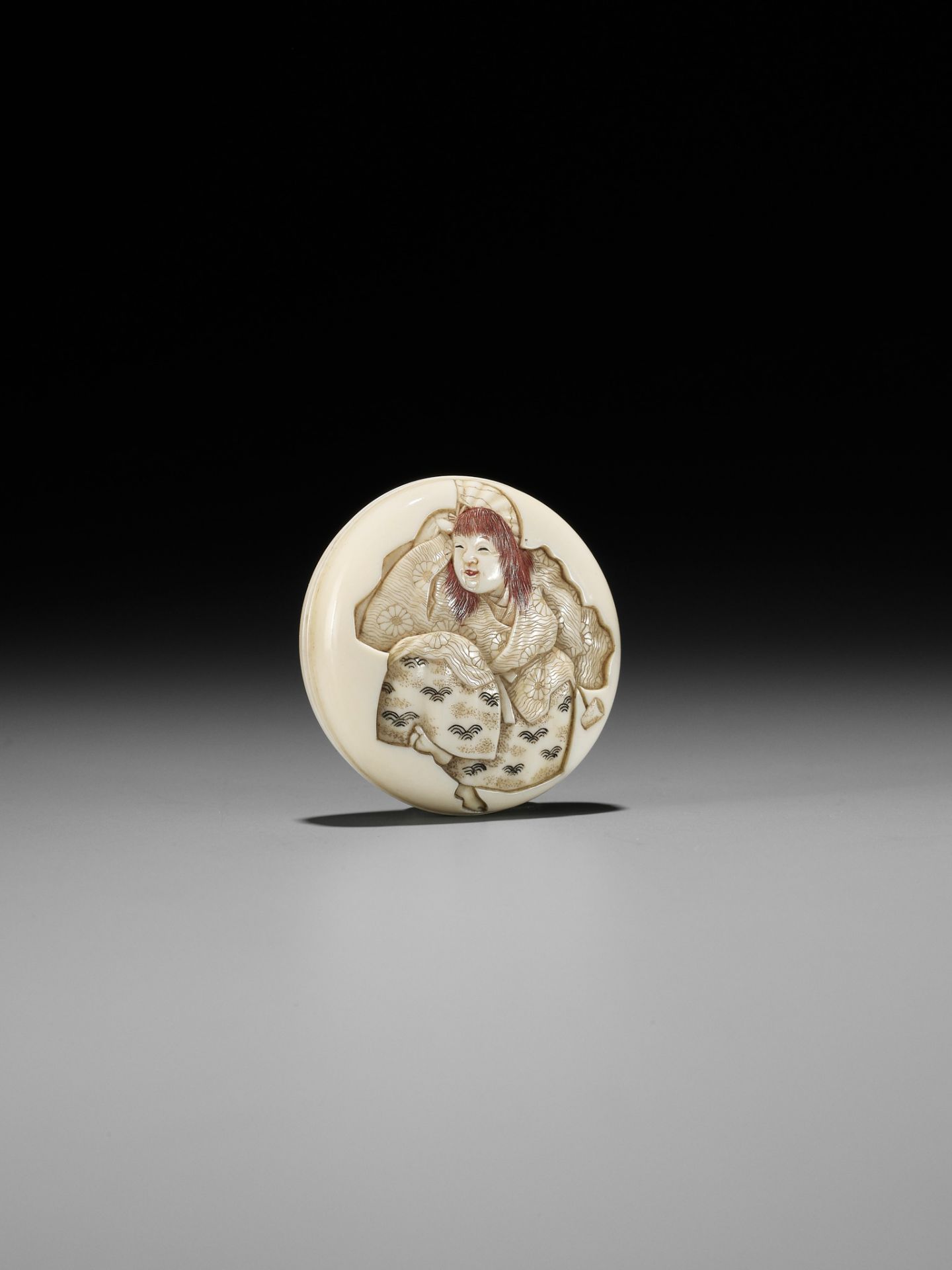 IKKOSAI: AN IVORY MANJU NETSUKE OF A DRUNKEN SHOJO - Image 3 of 9