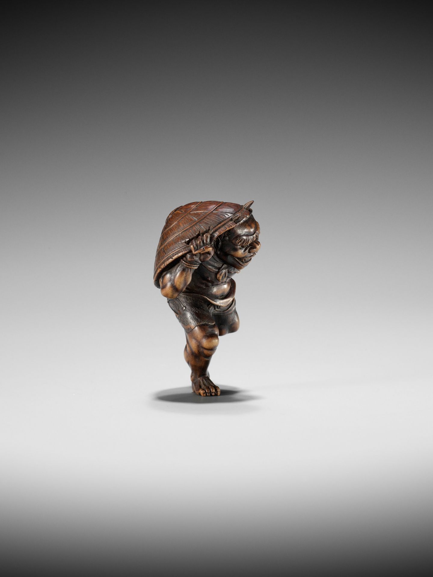 A WOOD NETSUKE OF AN ONI AT SETSUBUN, ATTRIBUTED TO ROKKO - Image 8 of 10