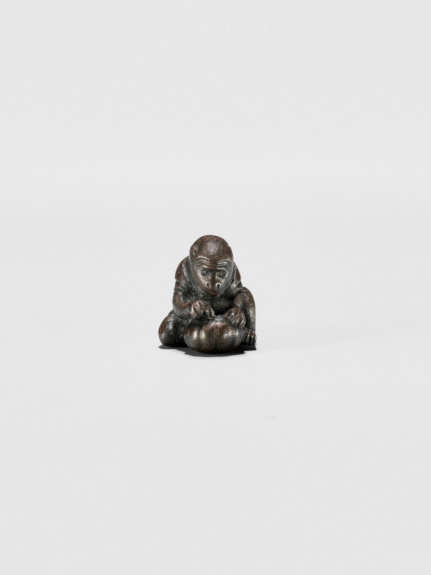 A RARE BRONZE NETSUKE OF A MONKEY WITH GOURD - Image 2 of 9