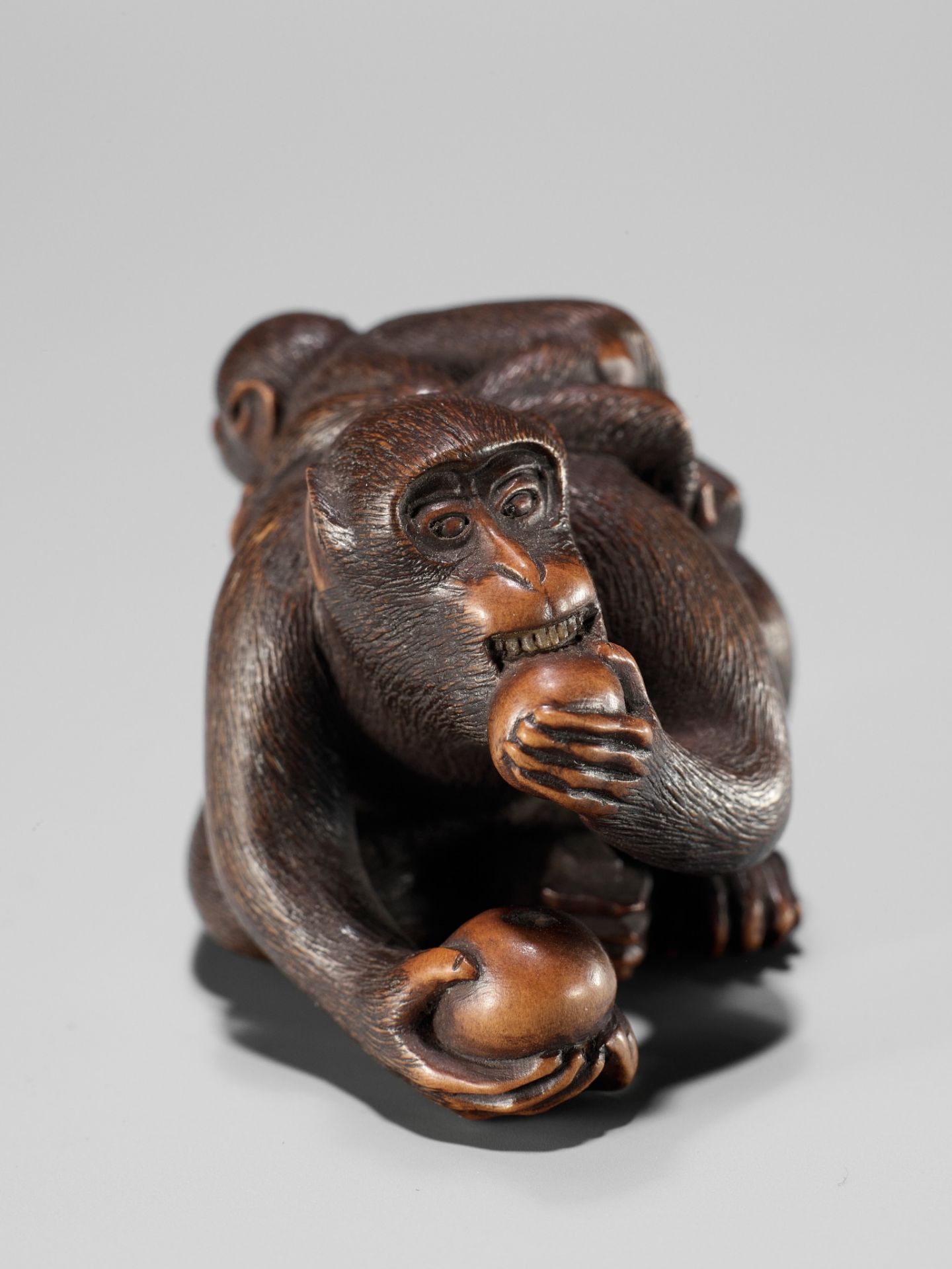 MASANAO: A WOOD NETSUKE OF A MONKEY AND YOUNG