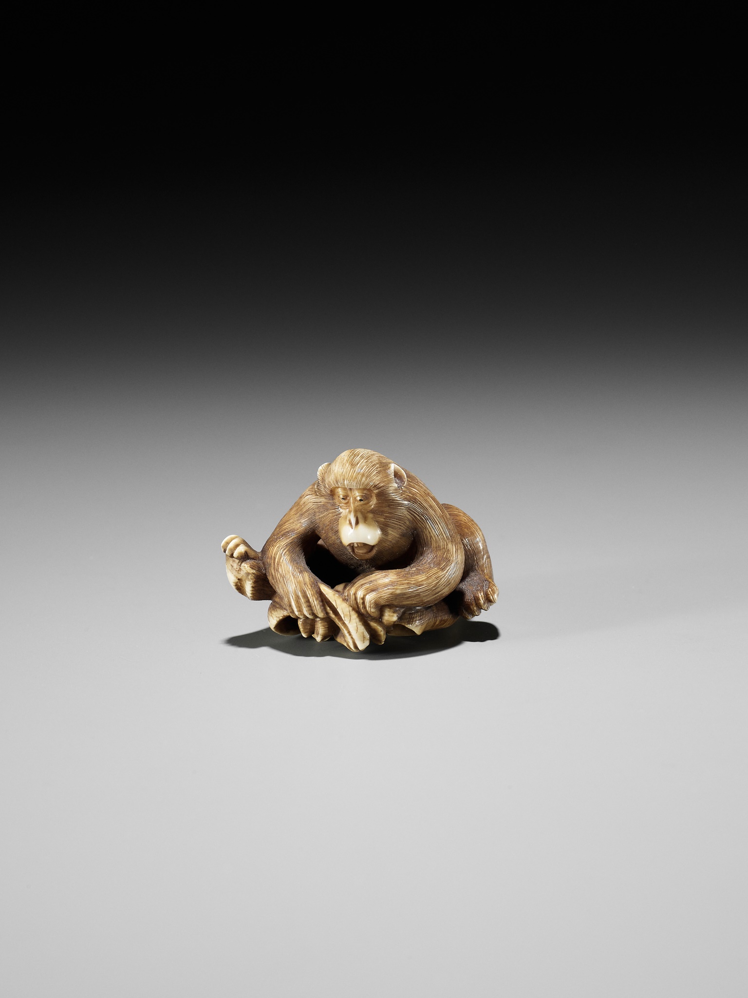 AN IVORY NETSUKE OF A MONKEY, CRAB AND LOTUS - Image 3 of 10