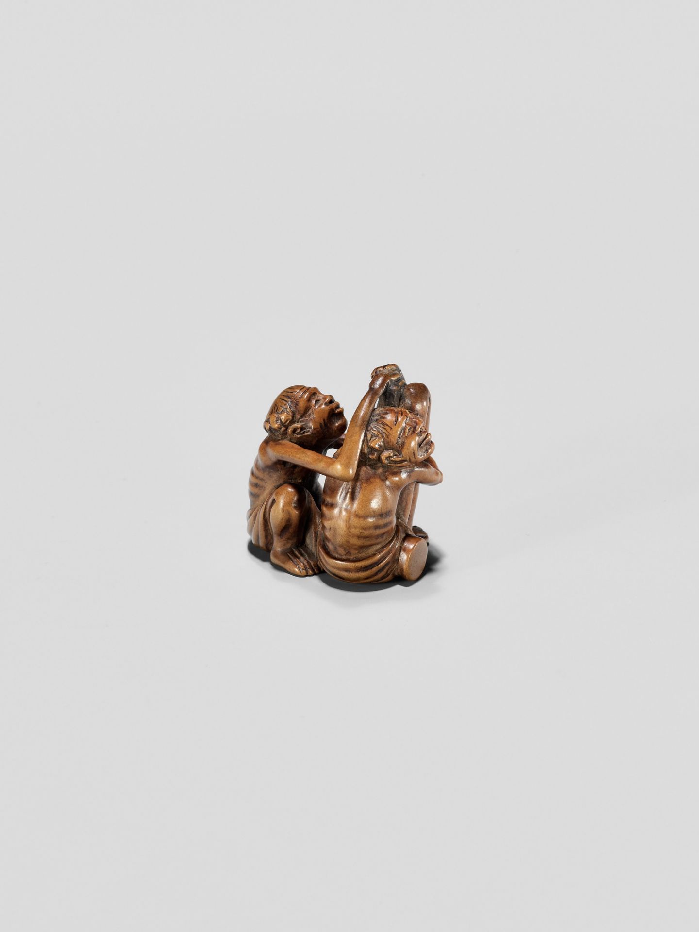 A TOMOCHIKA SCHOOL WOOD NETSUKE OF ASHINAGA AND TENAGA - Image 7 of 10