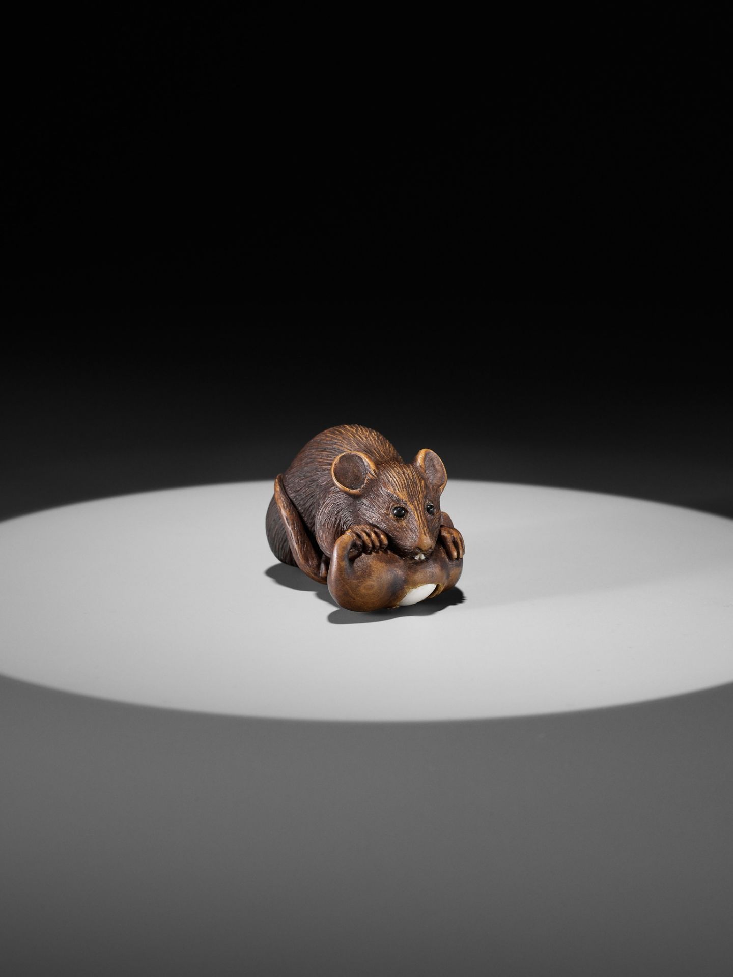 ALEXANDER DERKACHENKO: A WOOD NETSUKE OF A RAT WITH A BEAN-POD - Image 7 of 11