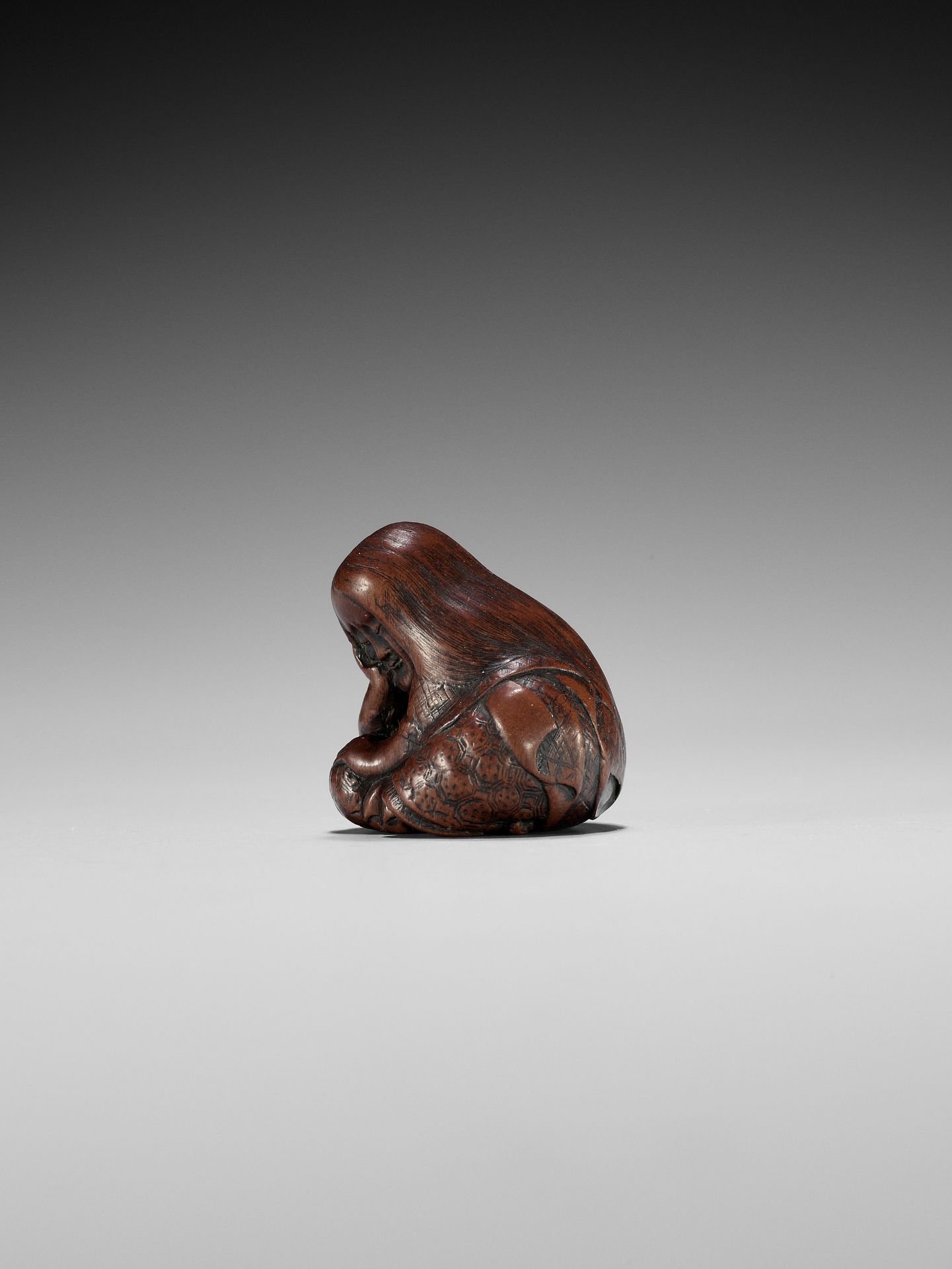 TOSHIKAZU: A NAGOYA SCHOOL WOOD NETSUKE OF A SEATED SLEEPING SHOJO - Image 3 of 12