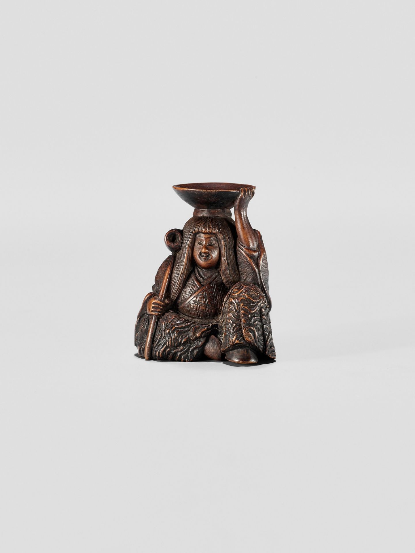 HIDEHARU: A NAGOYA SCHOOL WOOD NETSUKE OF A DRUNKEN SHOJO WITH LADLE AND SAKE SAUCER - Image 9 of 11