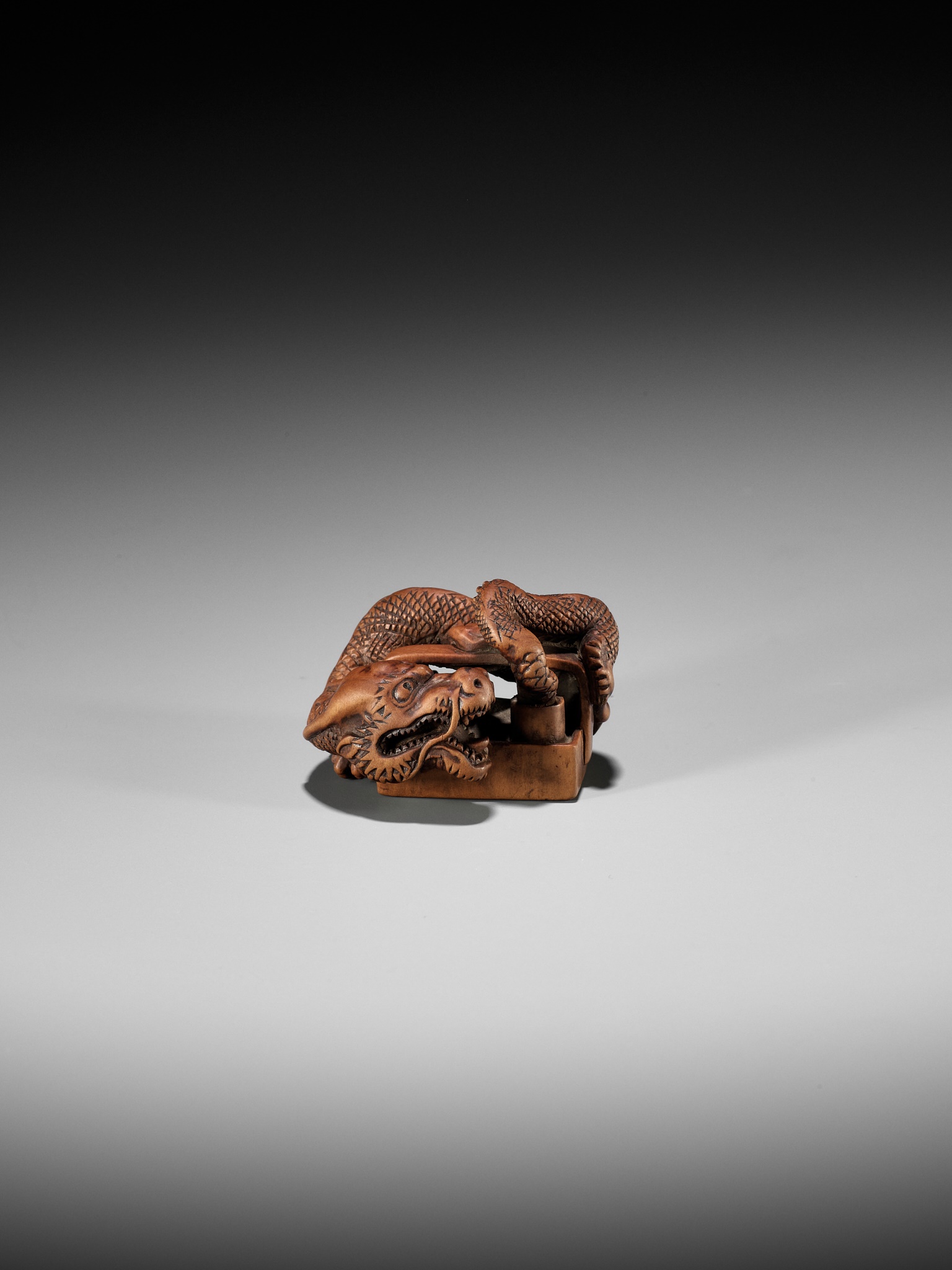 A WOOD NETSUKE OF A DRAGON EMERGING FROM AN ASH POT (HAIFUKI KARA RYU) - Image 7 of 12