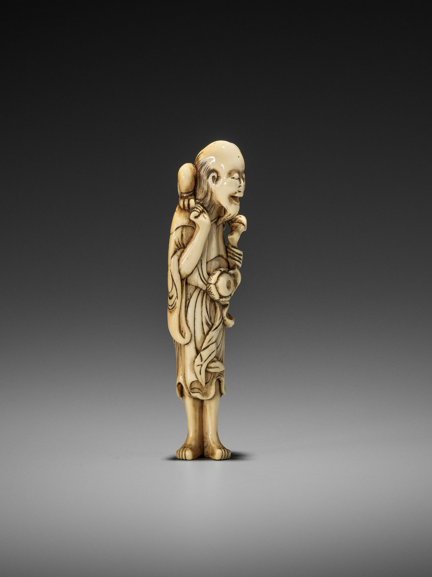 A RARE IVORY NETSUKE OF A SENNIN WITH ONI - Image 6 of 9