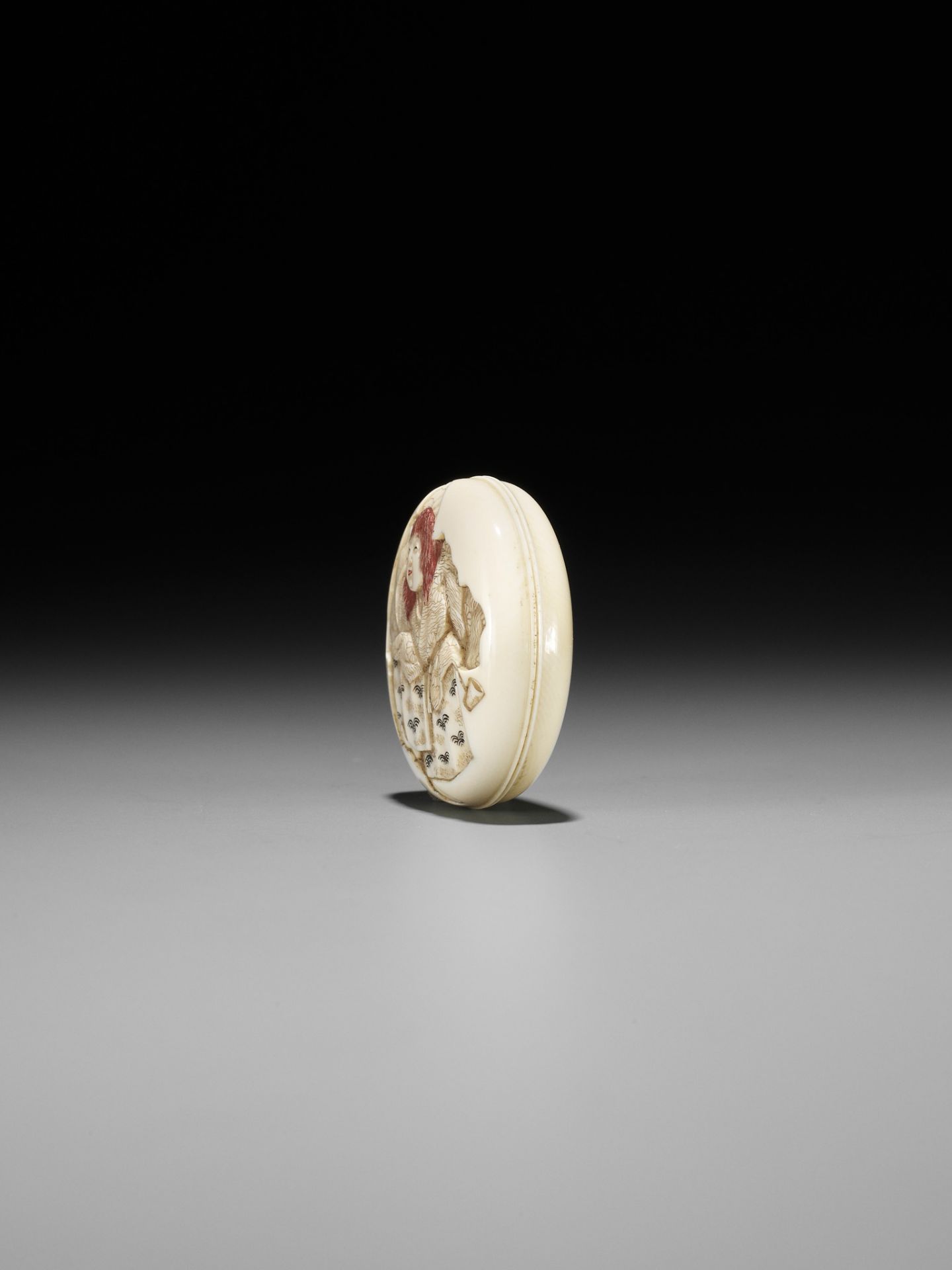 IKKOSAI: AN IVORY MANJU NETSUKE OF A DRUNKEN SHOJO - Image 4 of 9