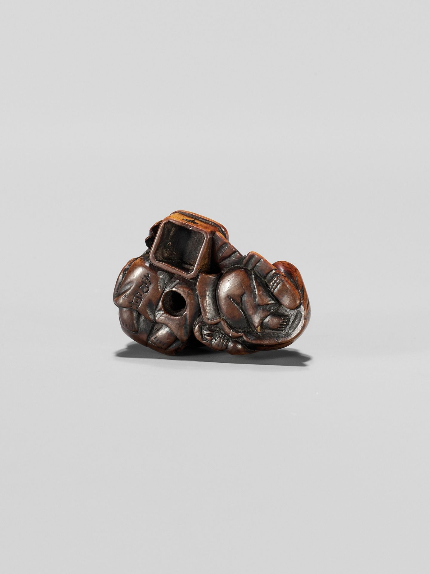 HIDESADA: A FINE WOOD NETSUKE OF OKAME AND FUKUSUKE - Image 11 of 12