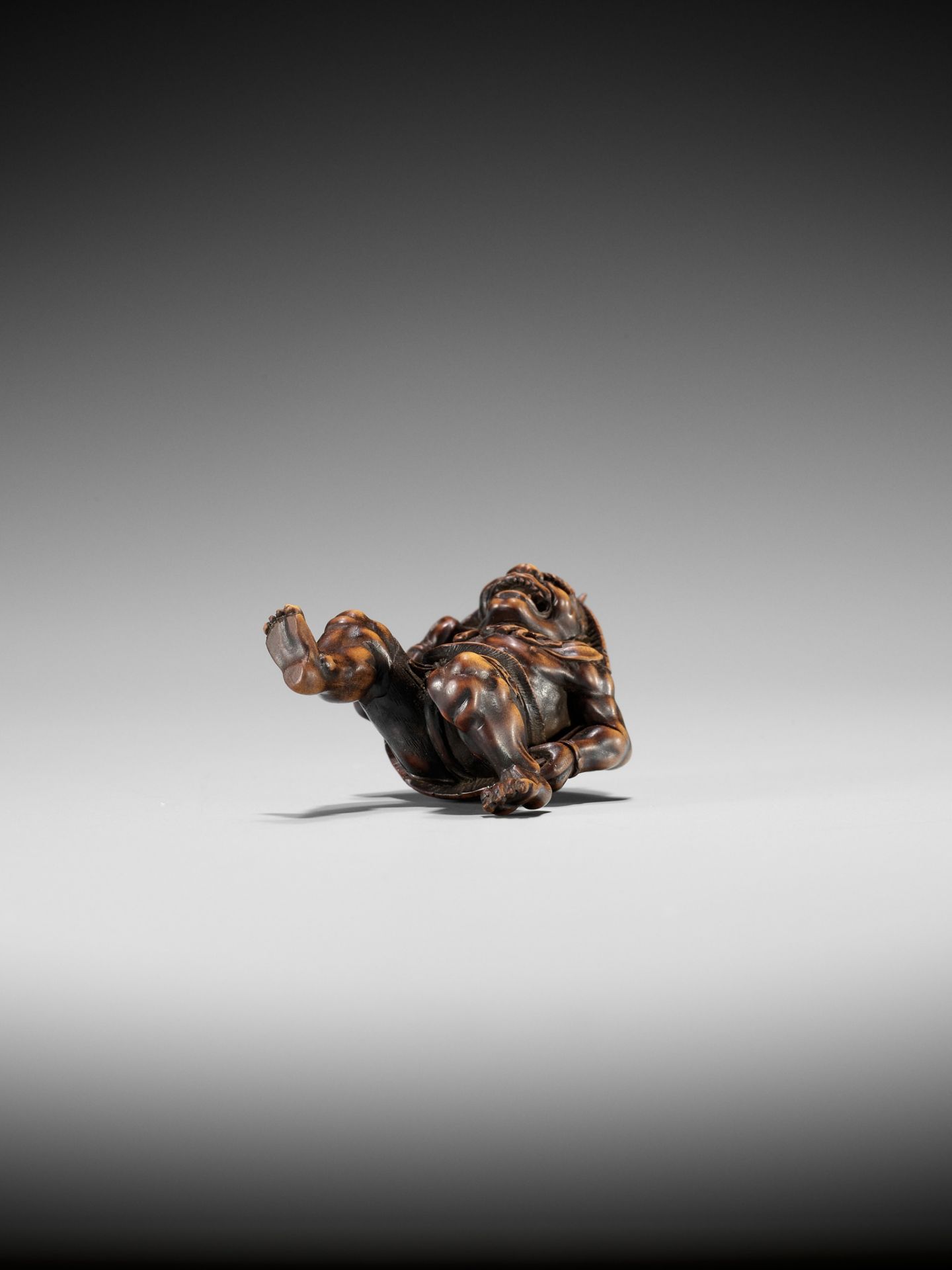 A WOOD NETSUKE OF AN ONI AT SETSUBUN, ATTRIBUTED TO ROKKO - Image 10 of 10