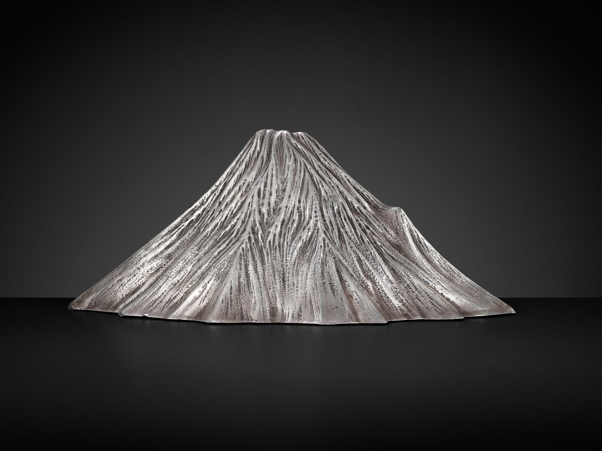 JUKOSHI MITSUTSUGU: AN ICONIC AND LARGE SILVER OKIMONO OF MOUNT FUJI - Image 6 of 9