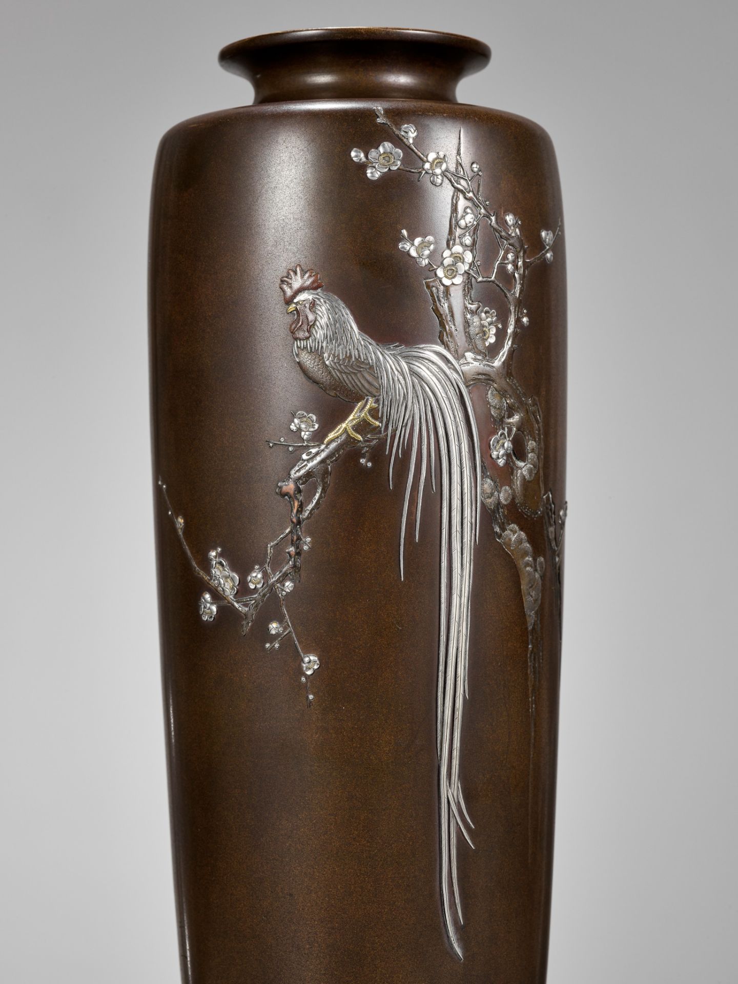 KOITSU: A FINE AND LARGE NOGAWA COMPANY INLAID BRONZE VASE WITH A ROOSTER AND CHERRY BLOSSOMS