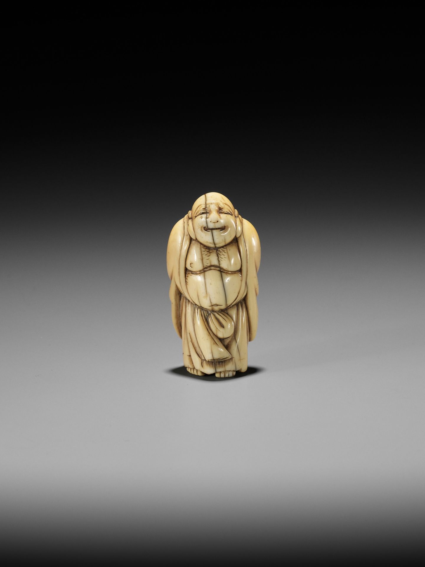 TOMO: AN EARLY OSAKA SCHOOL IVORY NETSUKE OF HOTEI - Image 7 of 10