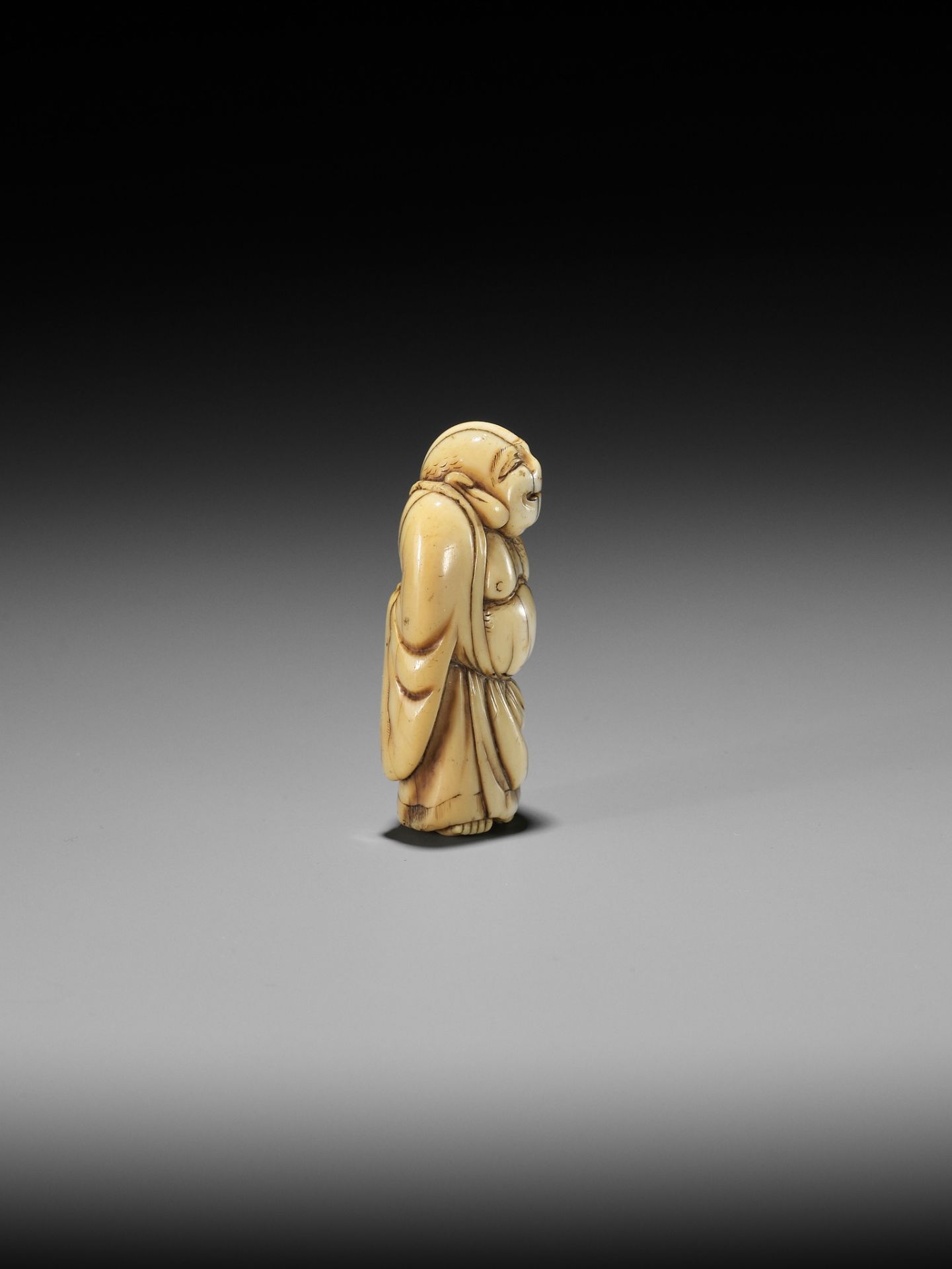 TOMO: AN EARLY OSAKA SCHOOL IVORY NETSUKE OF HOTEI - Image 6 of 10