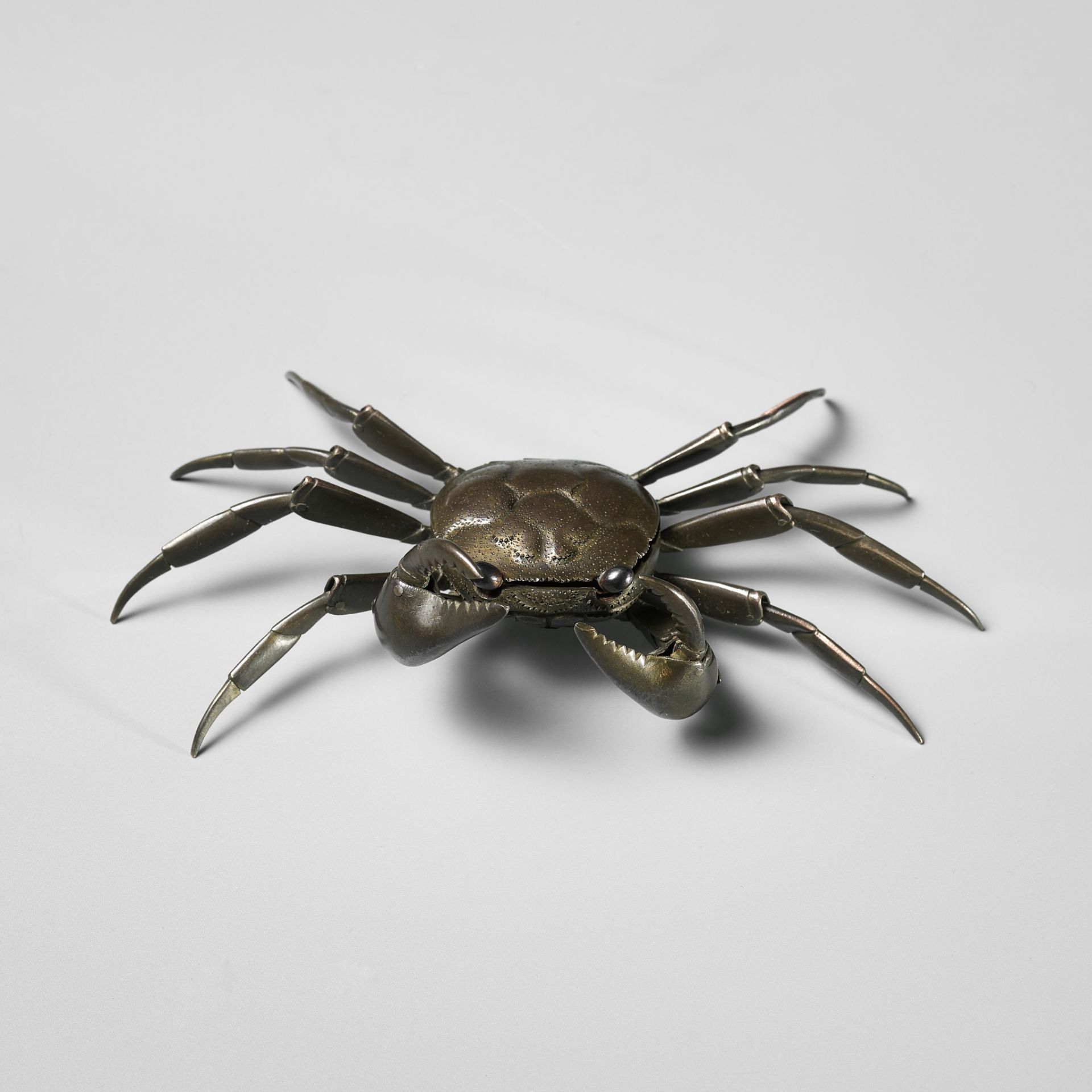 MYOCHIN MUNEYOSHI: A RARE SHIBUICHI ARTICULATED JIZAI HAKO (BOX) OKIMONO OF A CRAB