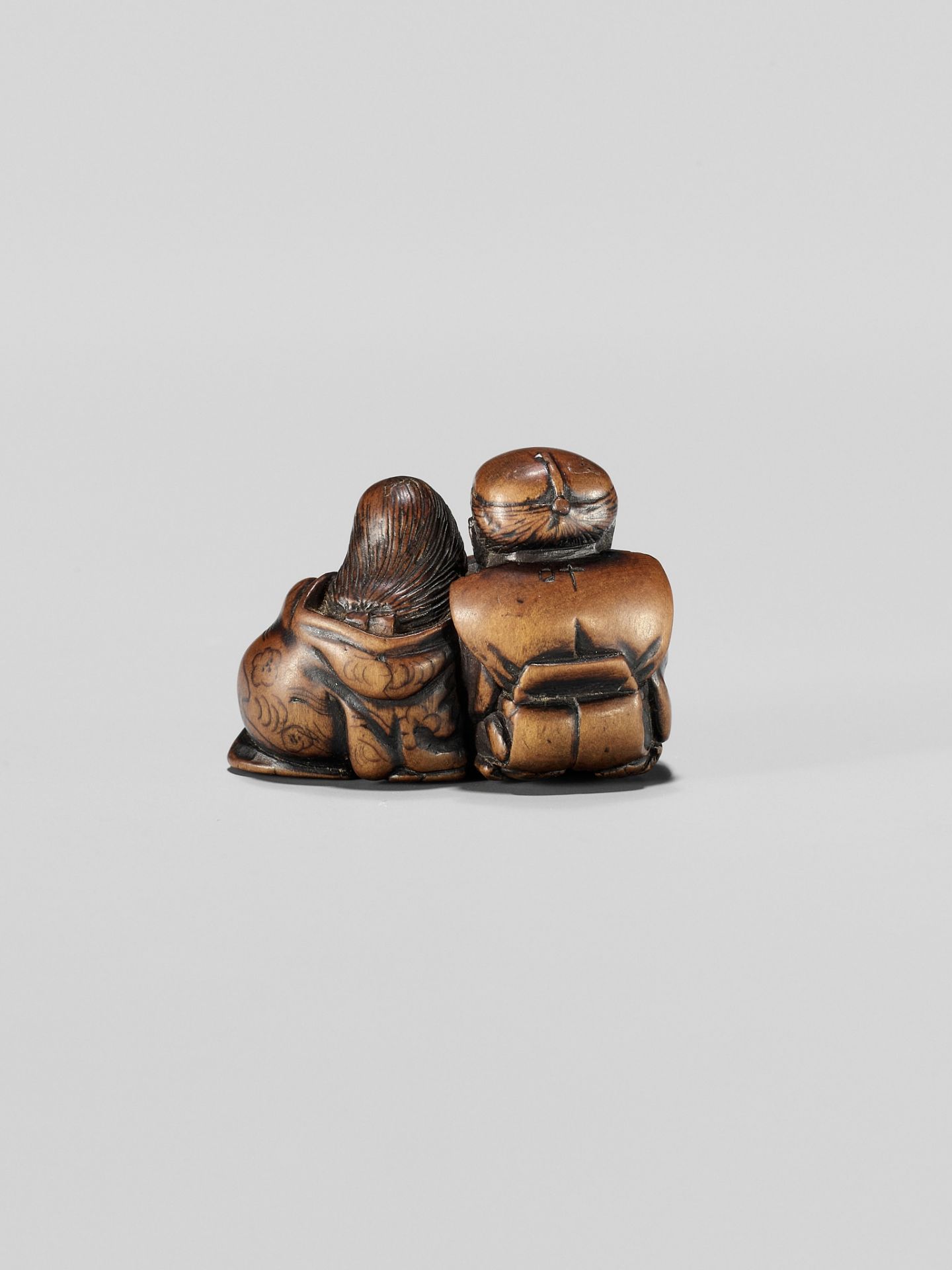 HIDESADA: A FINE WOOD NETSUKE OF OKAME AND FUKUSUKE - Image 4 of 12