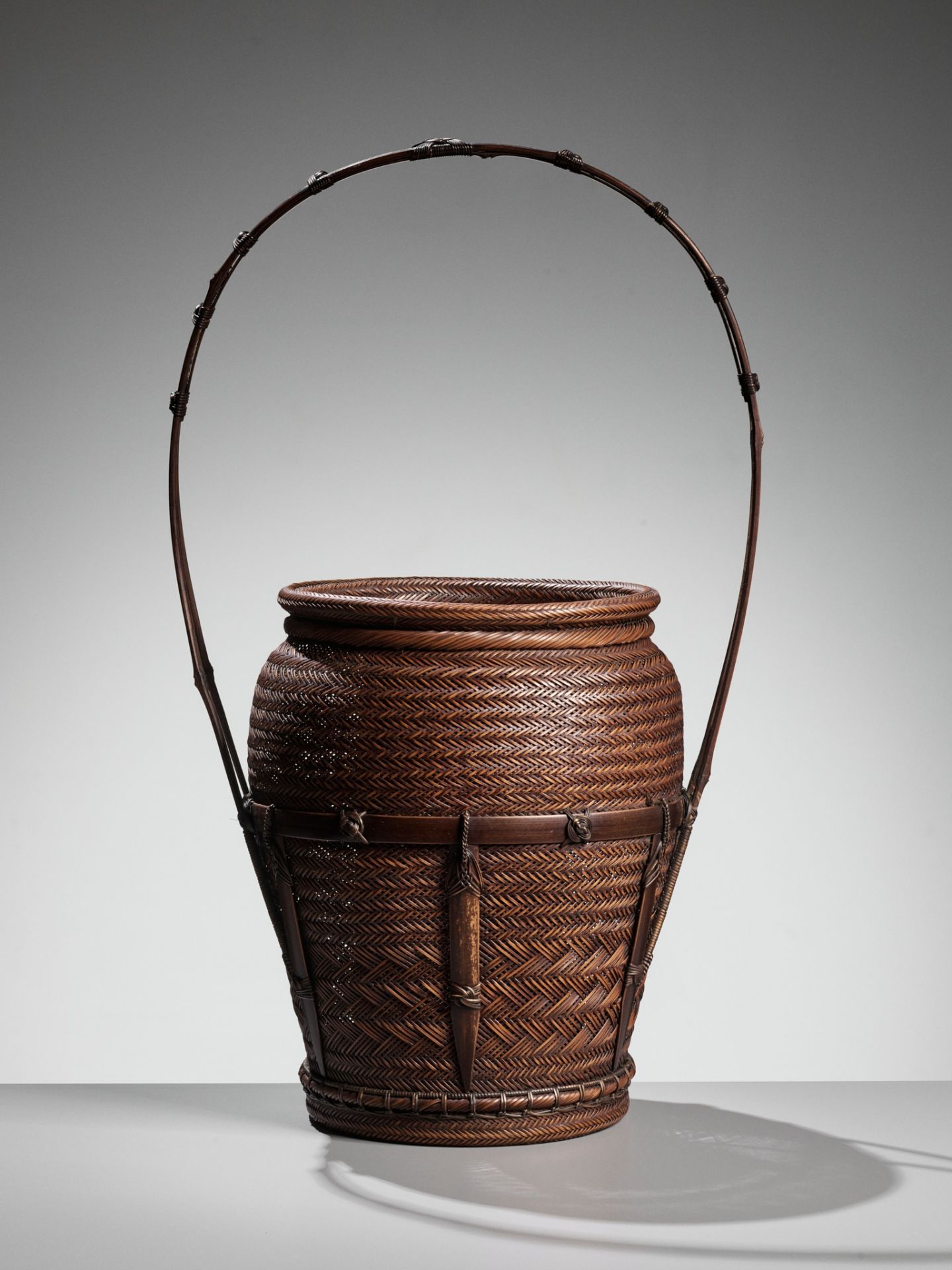 OMORI CHIKUYUSAI: A FINE WOVEN BAMBOO AND RATTAN HANAKAGO (FLOWER BASKET)