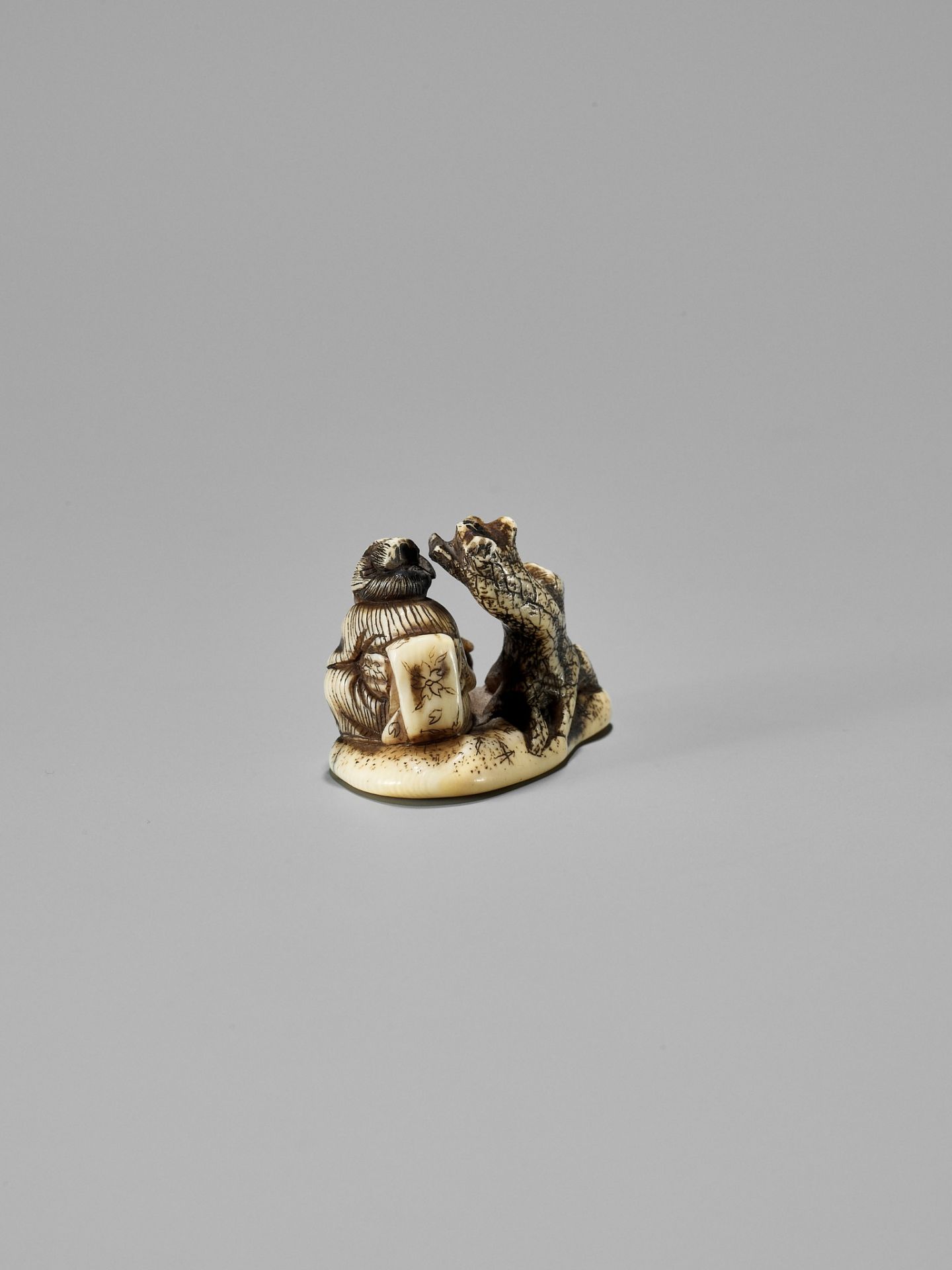 SHIGEMASA: AN AMUSING OSAKA SCHOOL SHUNGA IVORY NETSUKE OF OKAME WITH MUSHROOM - Image 5 of 12