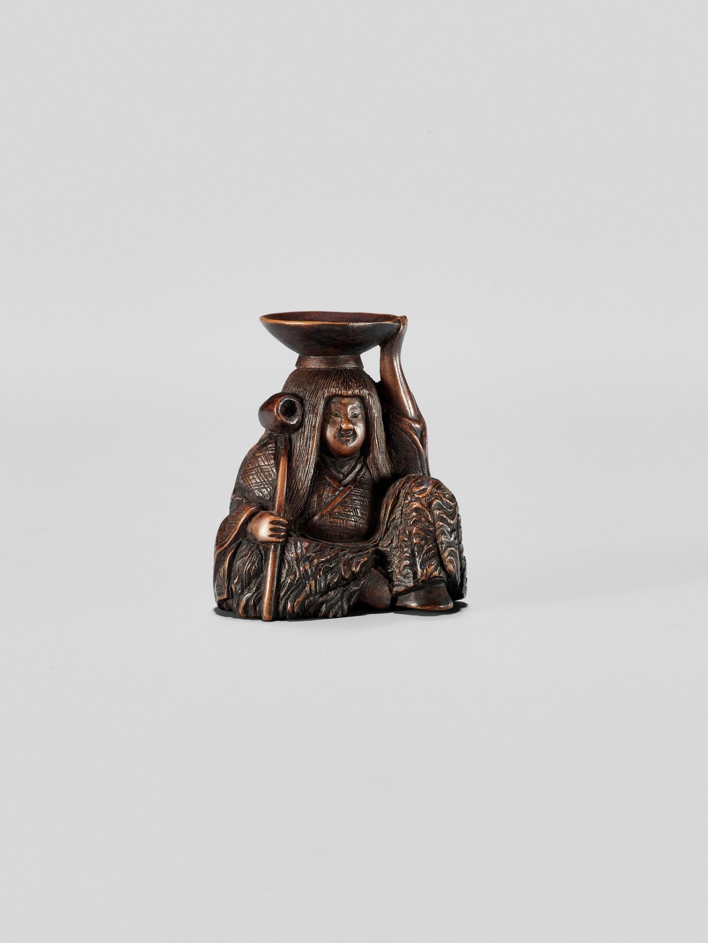 HIDEHARU: A NAGOYA SCHOOL WOOD NETSUKE OF A DRUNKEN SHOJO WITH LADLE AND SAKE SAUCER - Image 8 of 11