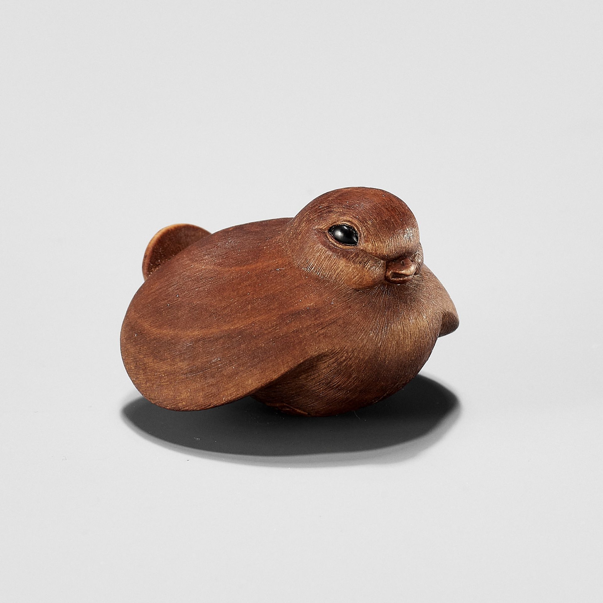 VADYM PYVOVAR: A WOOD NETSUKE OF THE FUKURA SUZUME